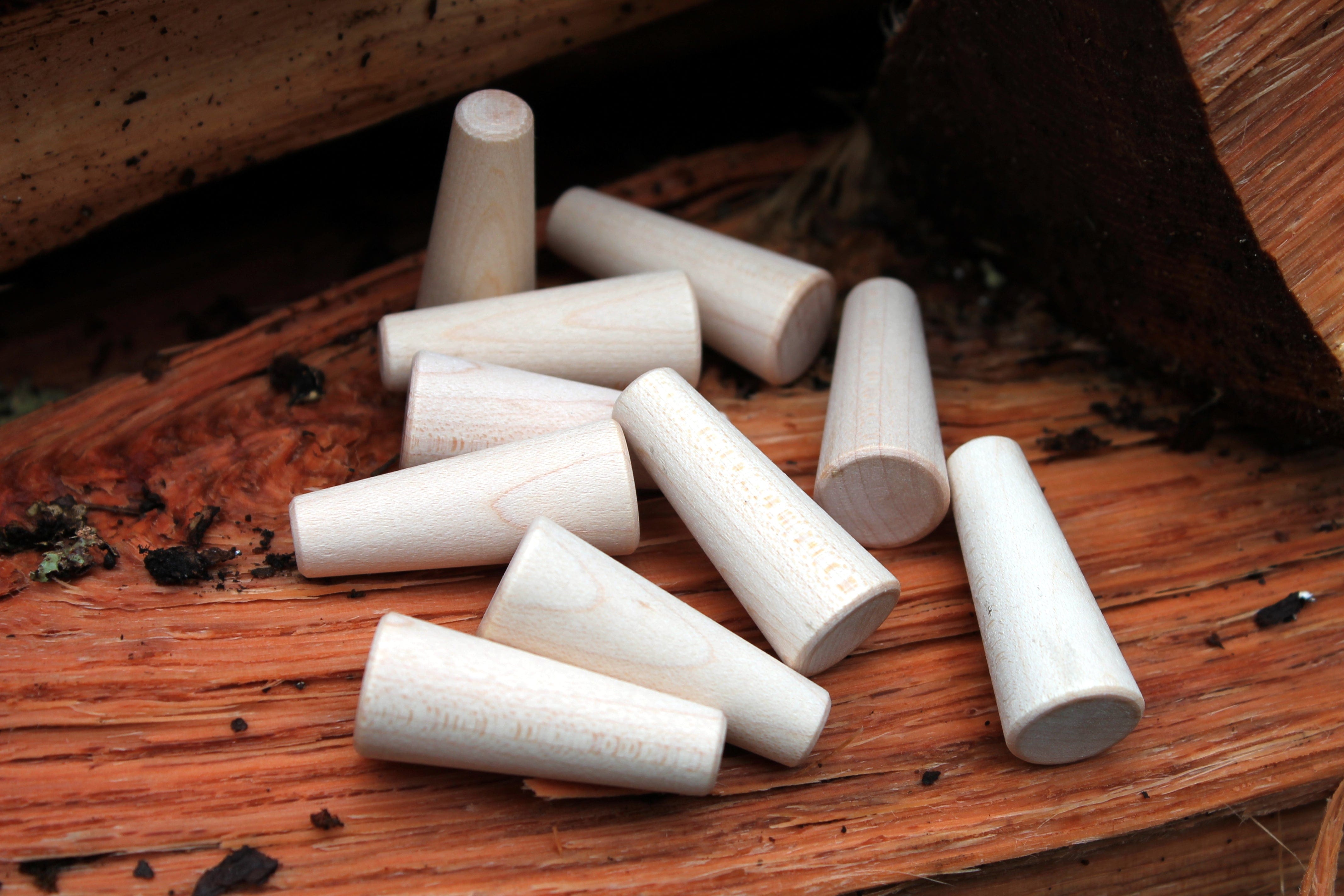 Pack of tapered hard maple dowel wedges for securing axe handles