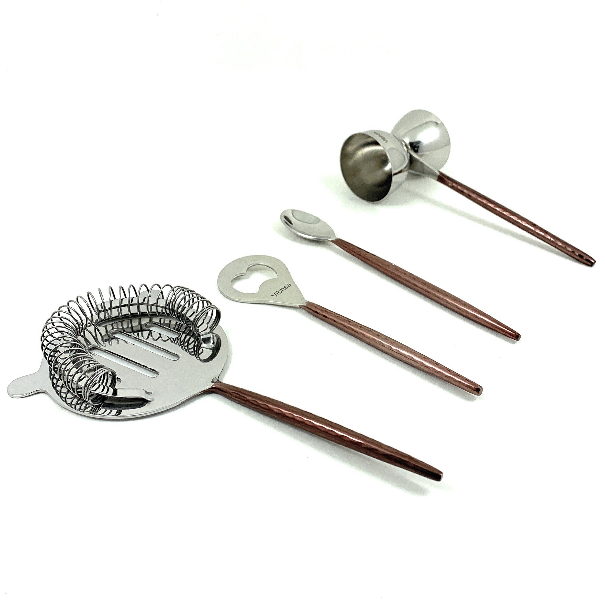Vibhsa copper hammered bartending kit set of 4 with flat opener, jigger, stirring spoon, and martini shaker on neutral background