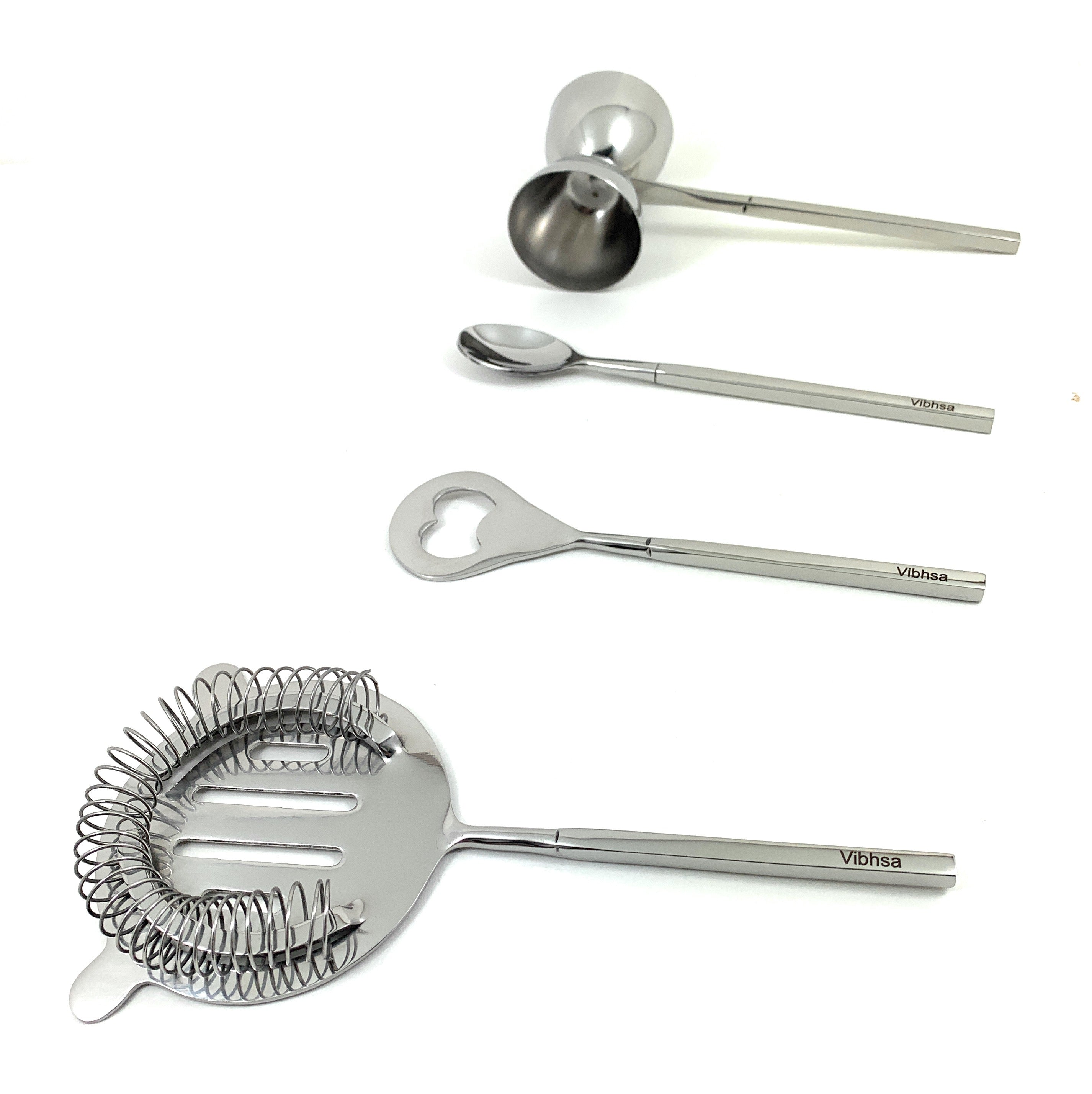 Vibhsa Silver Bar Tools Bartending Kit laid out with stirrer, jigger, martini shaker and opener