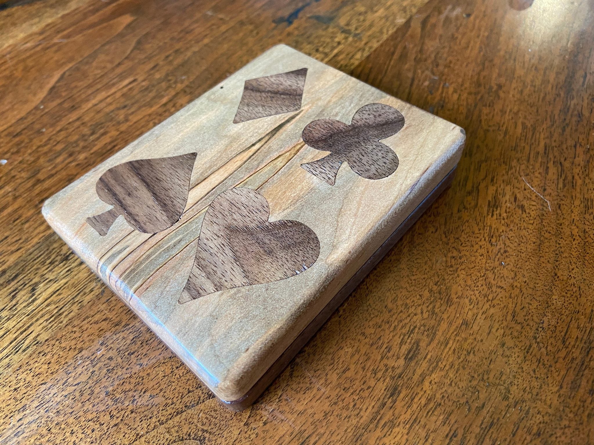 Handcrafted wooden playing card box with wood inlay detail