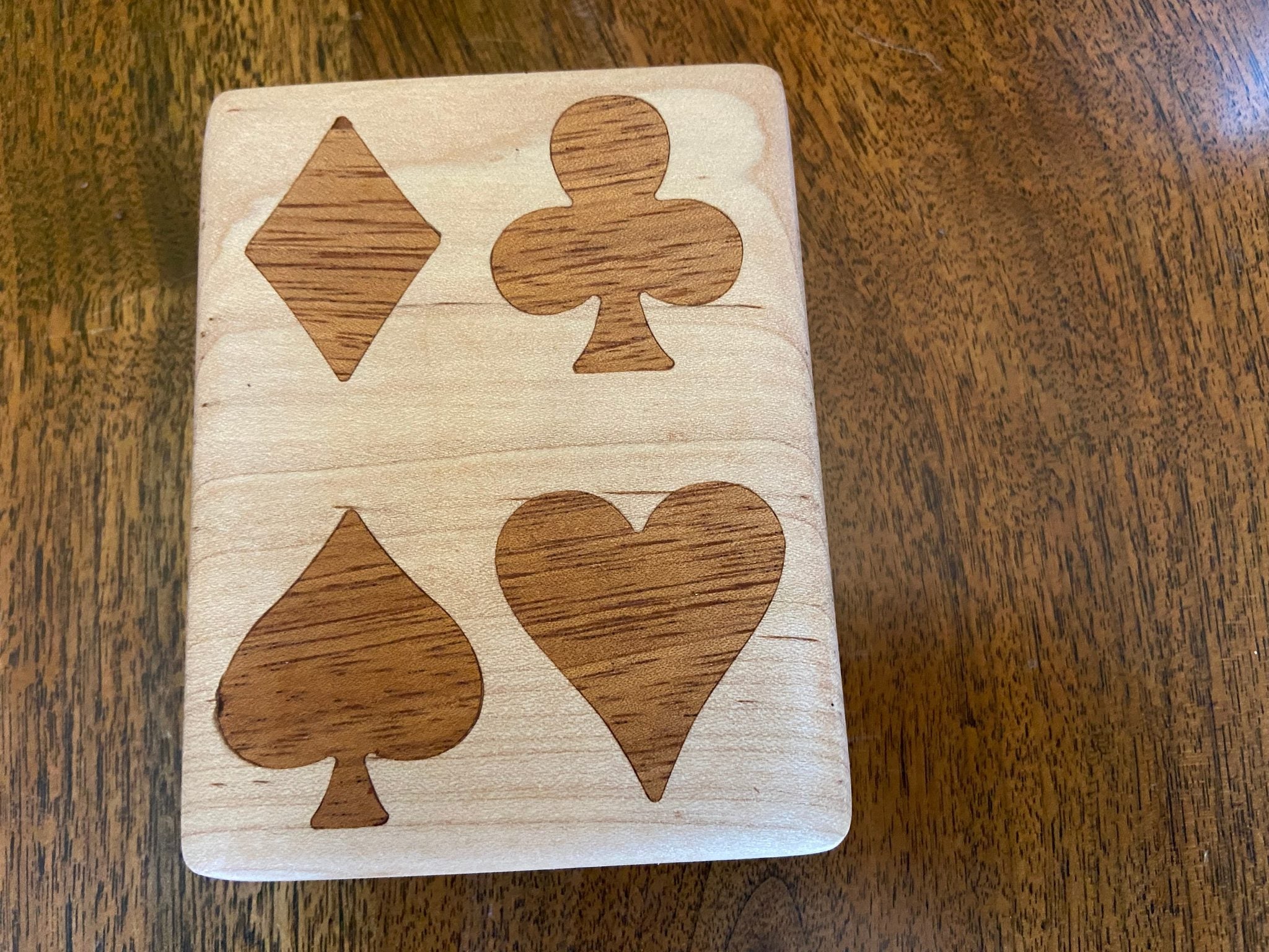 Handcrafted wooden playing card box with wood inlay detail
