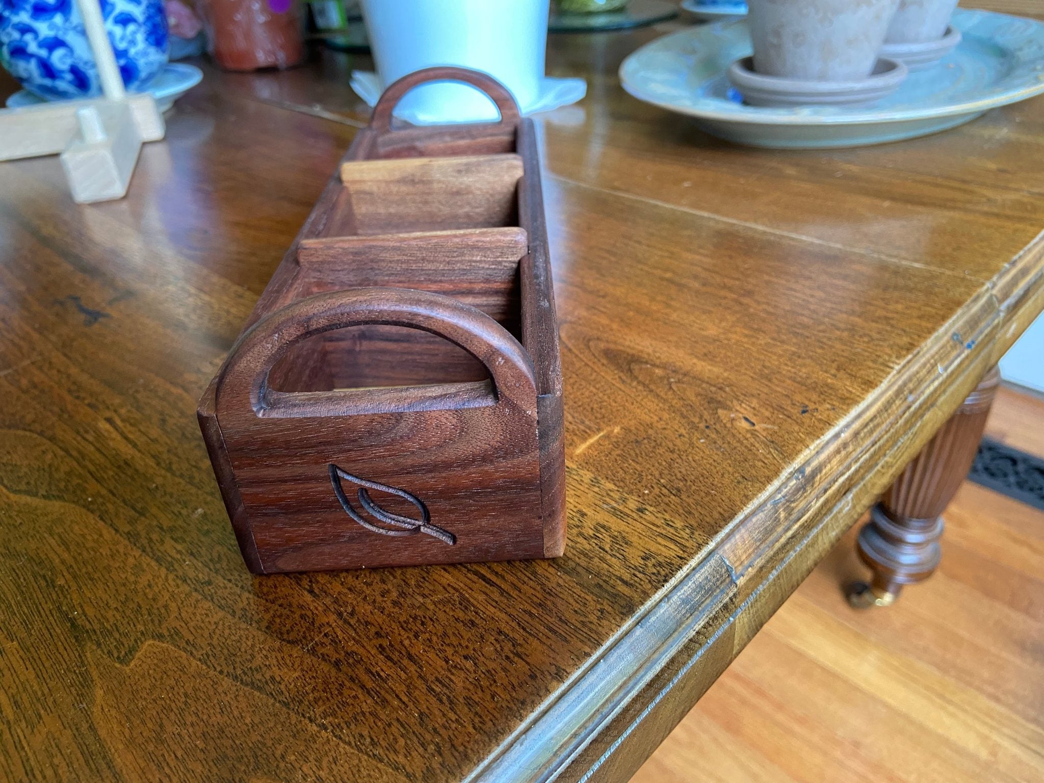 Hand-made walnut tea caddy with custom tea leaf engraving on each end
