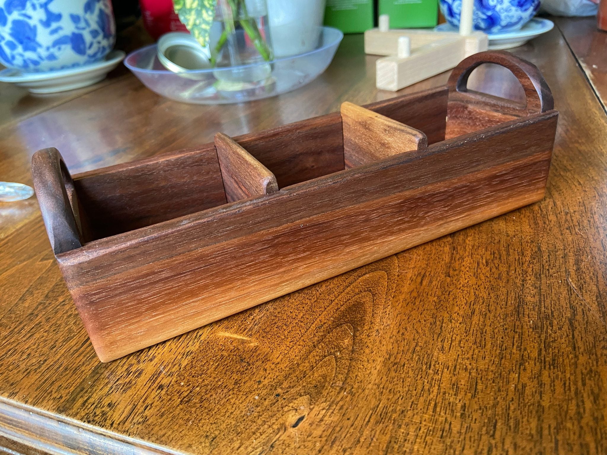 Hand-made walnut tea caddy with custom tea leaf engraving on each end