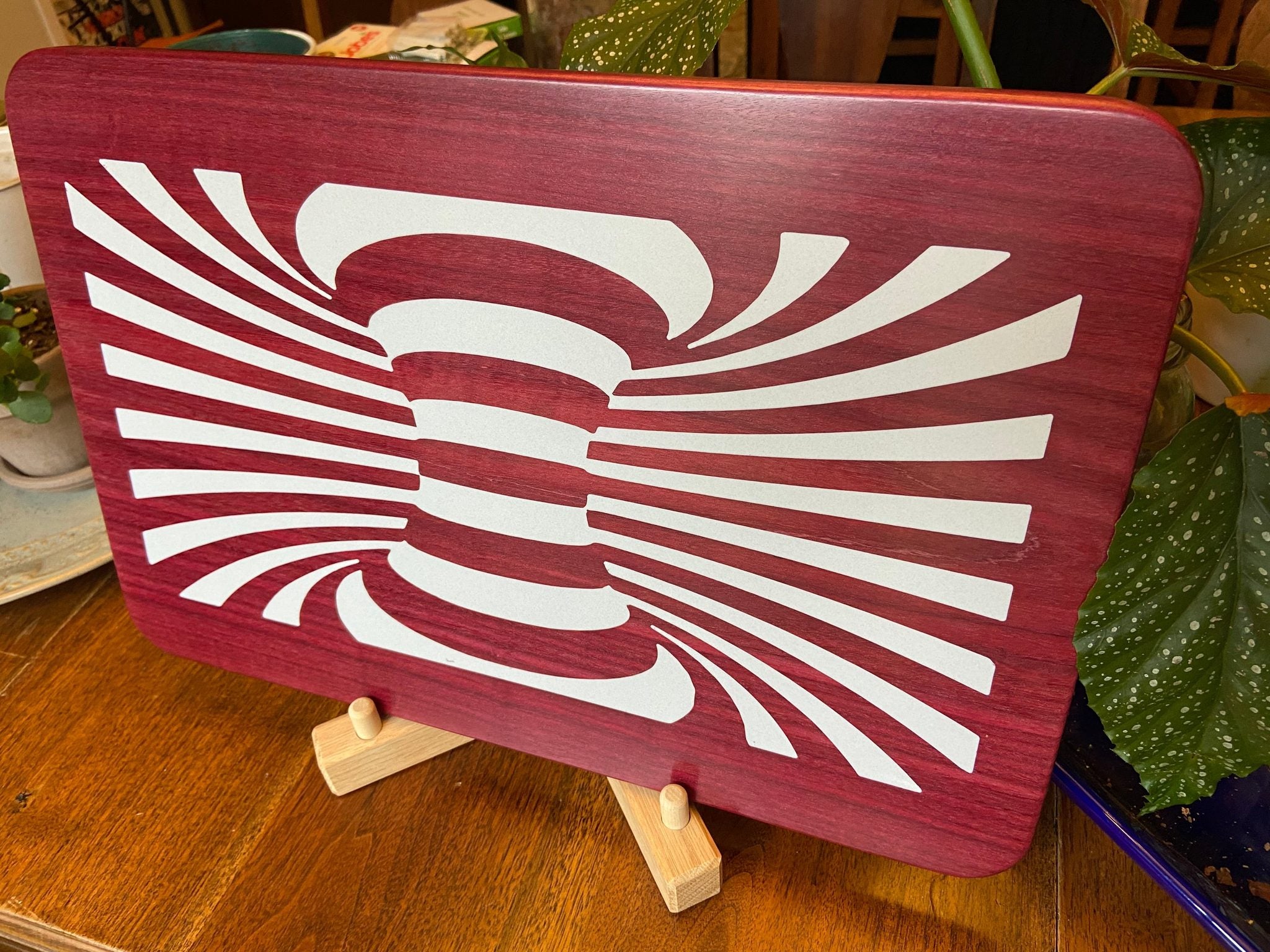 Purple Heart wood charcuterie board with resin worm hole inlay handcrafted by Fitzgerald Custom Woodcraft