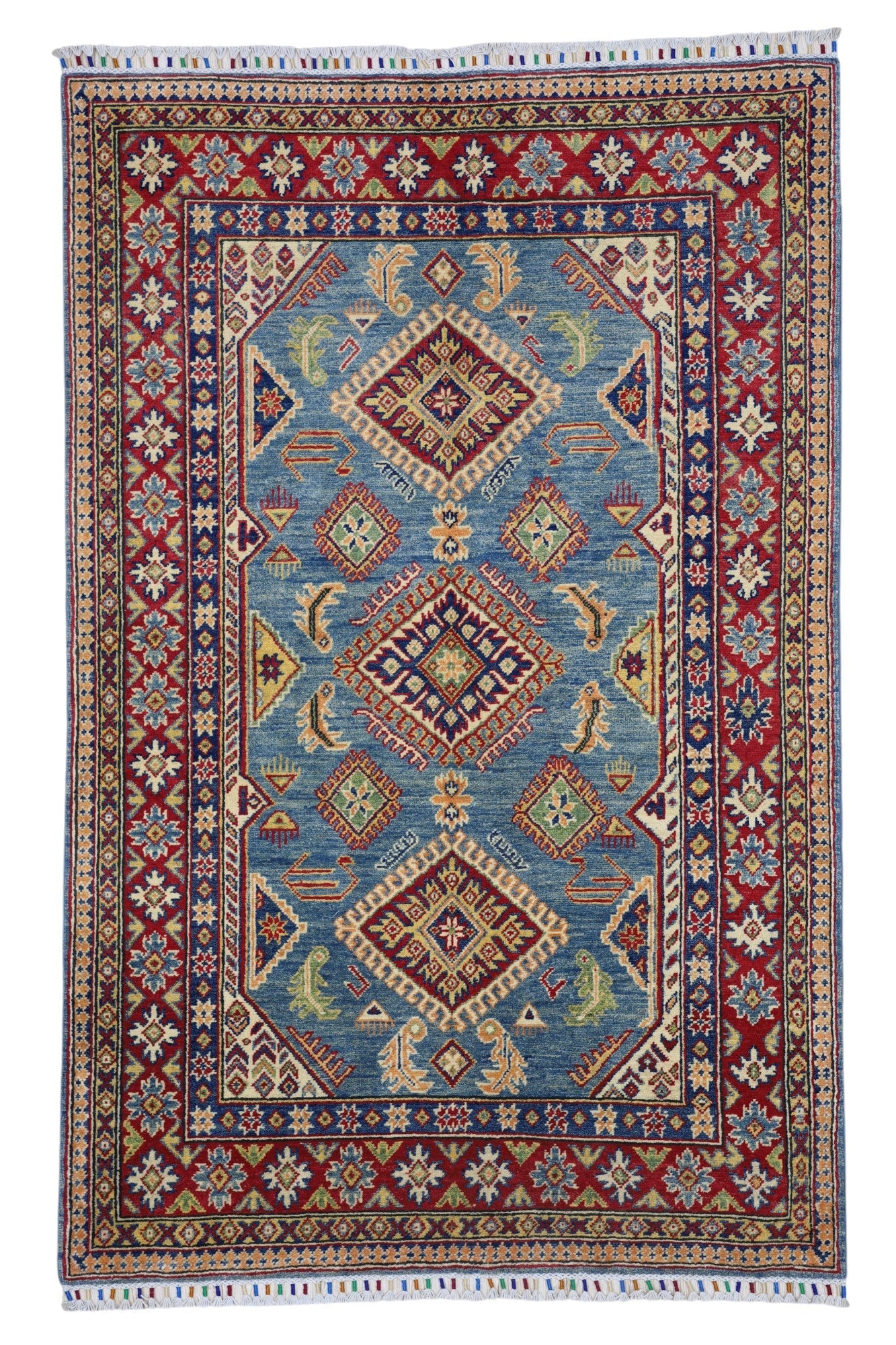 Hand-knotted Afghani Kazak wool rug in blue, cream, and red tones laid flat