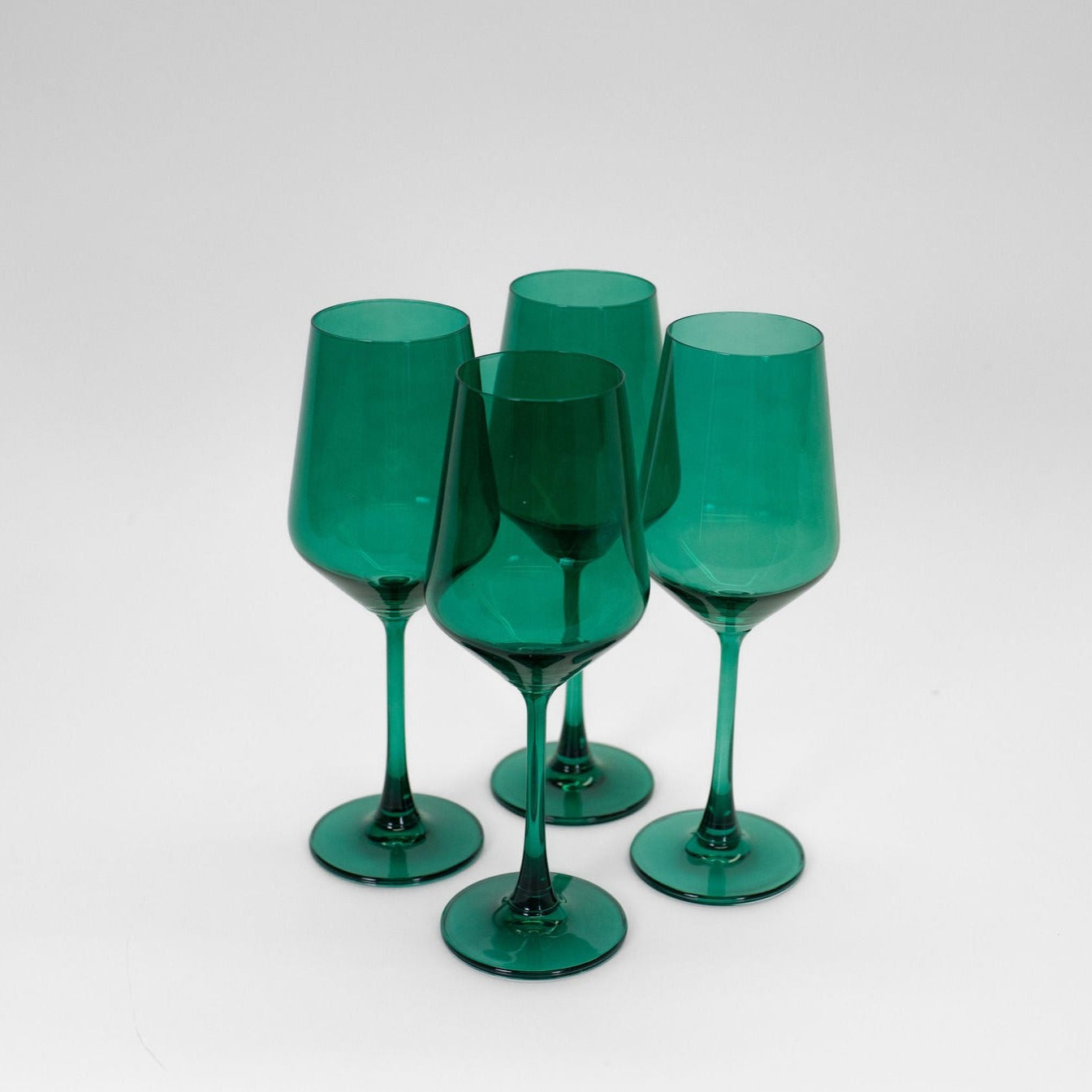 Emerald Green Stemmed Wine Glass on reflective surface