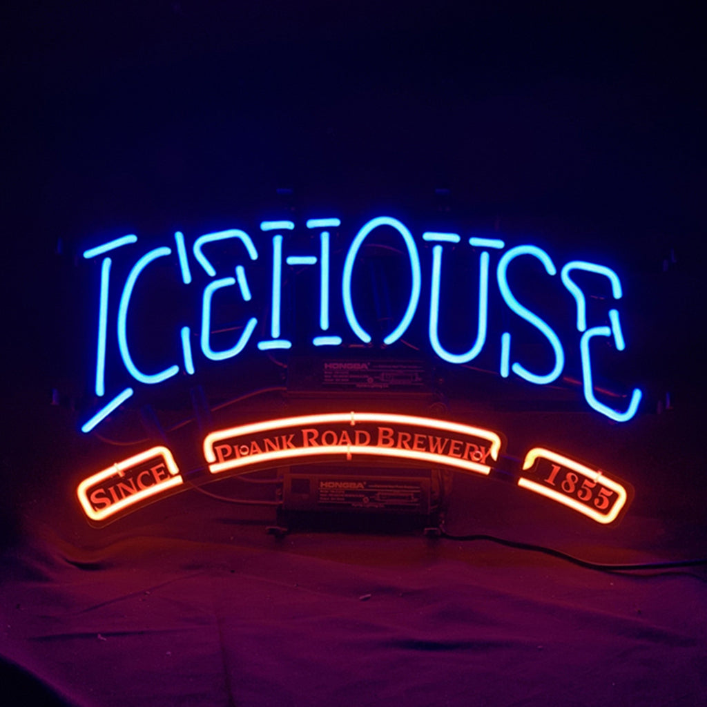 Icehouse Since Plank Road Brewery 1855 Neon Sign mounted on wall showing glowing white and warm yellow neon tubes around red lettering.