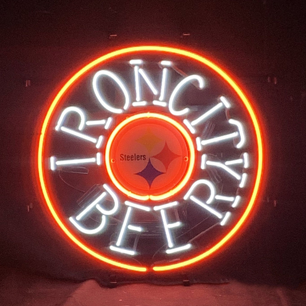 Iron City Beer Pittsburgh Steelers Neon Sign Light hanging against a neutral wall, illuminated with bright neon tubing.