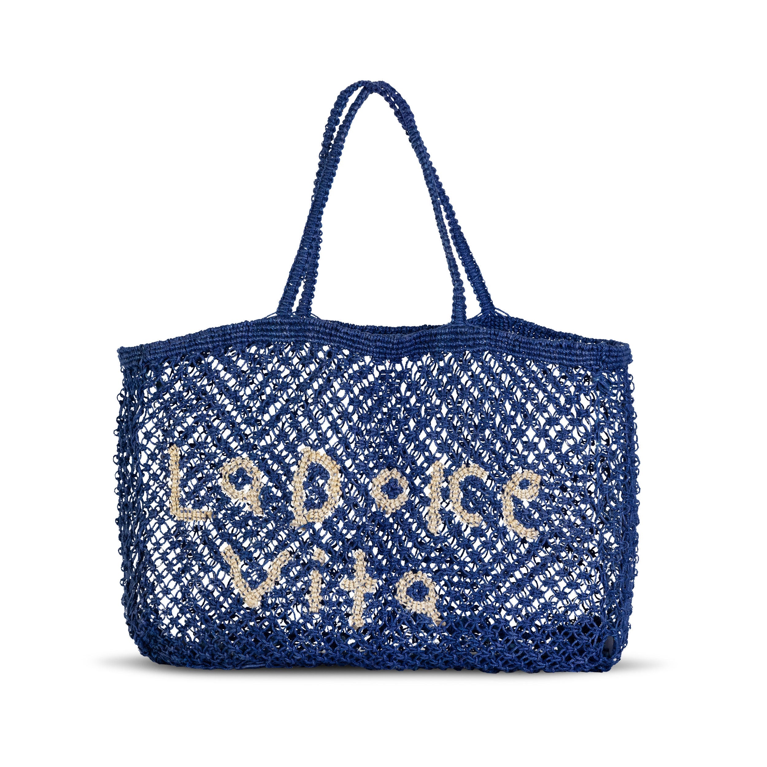 La Dolce Vita Macrame Jute Tote showing natural woven jute fibers and macramé knots