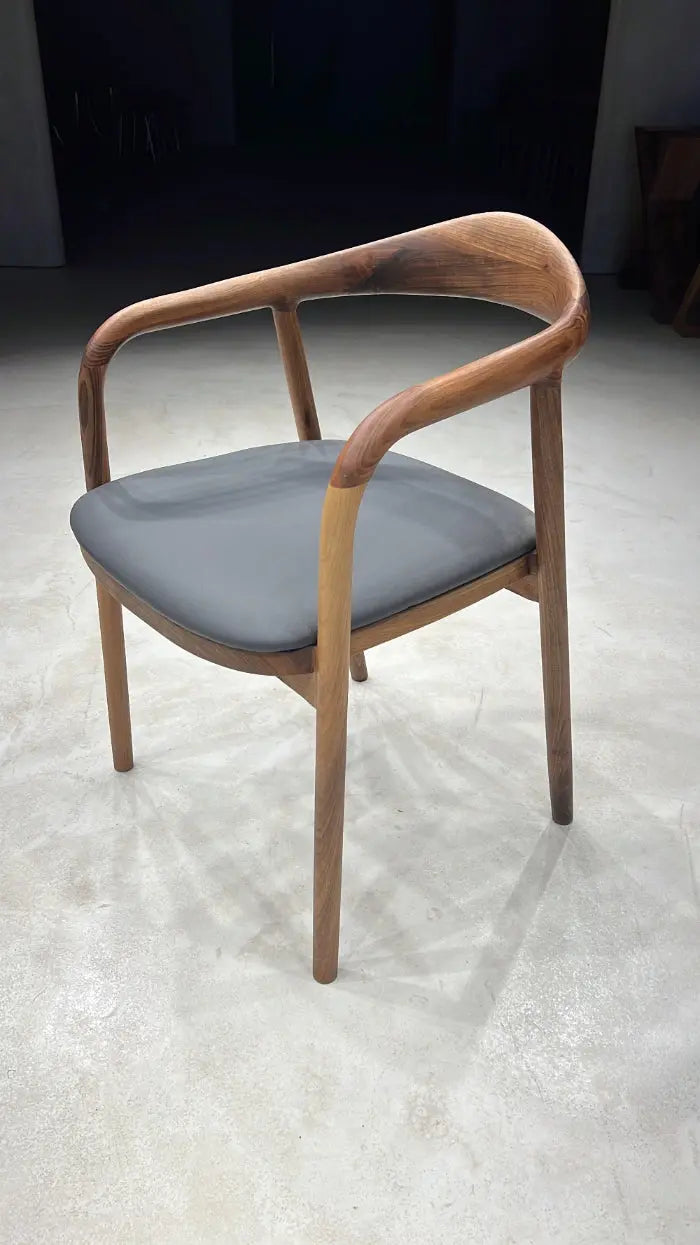 Luxury solid wood chair made of walnut with natural finish