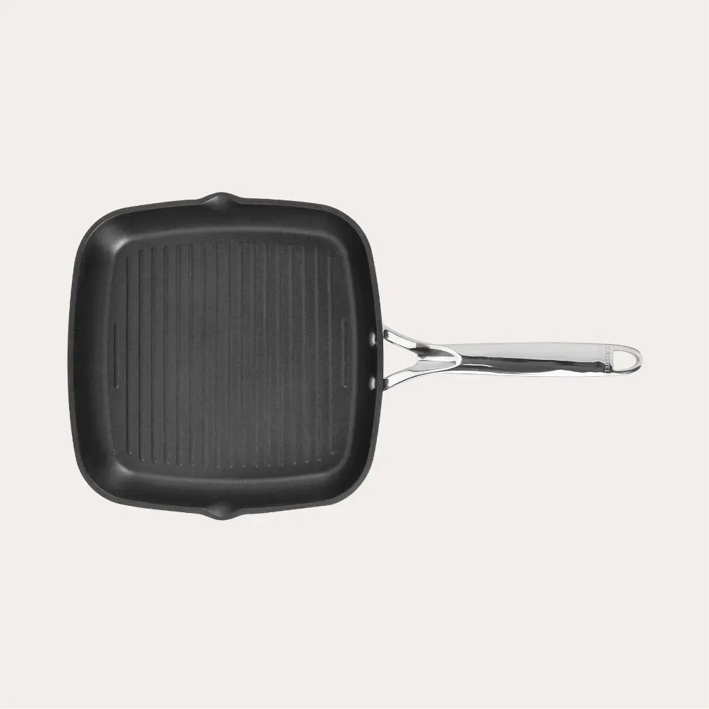 Non-stick Square grill by CRISTEL USA showing 28 x 28 cm size with stainless steel handle