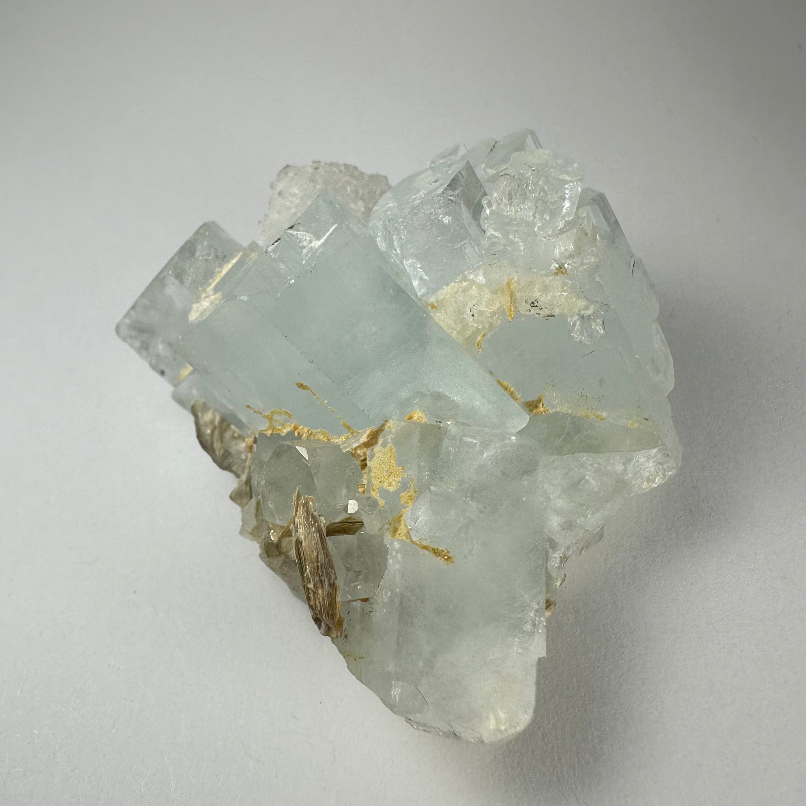 Aquamarine crystal cluster from Shigar Valley, Skardu, Pakistan, showing translucent blue-green crystal points.