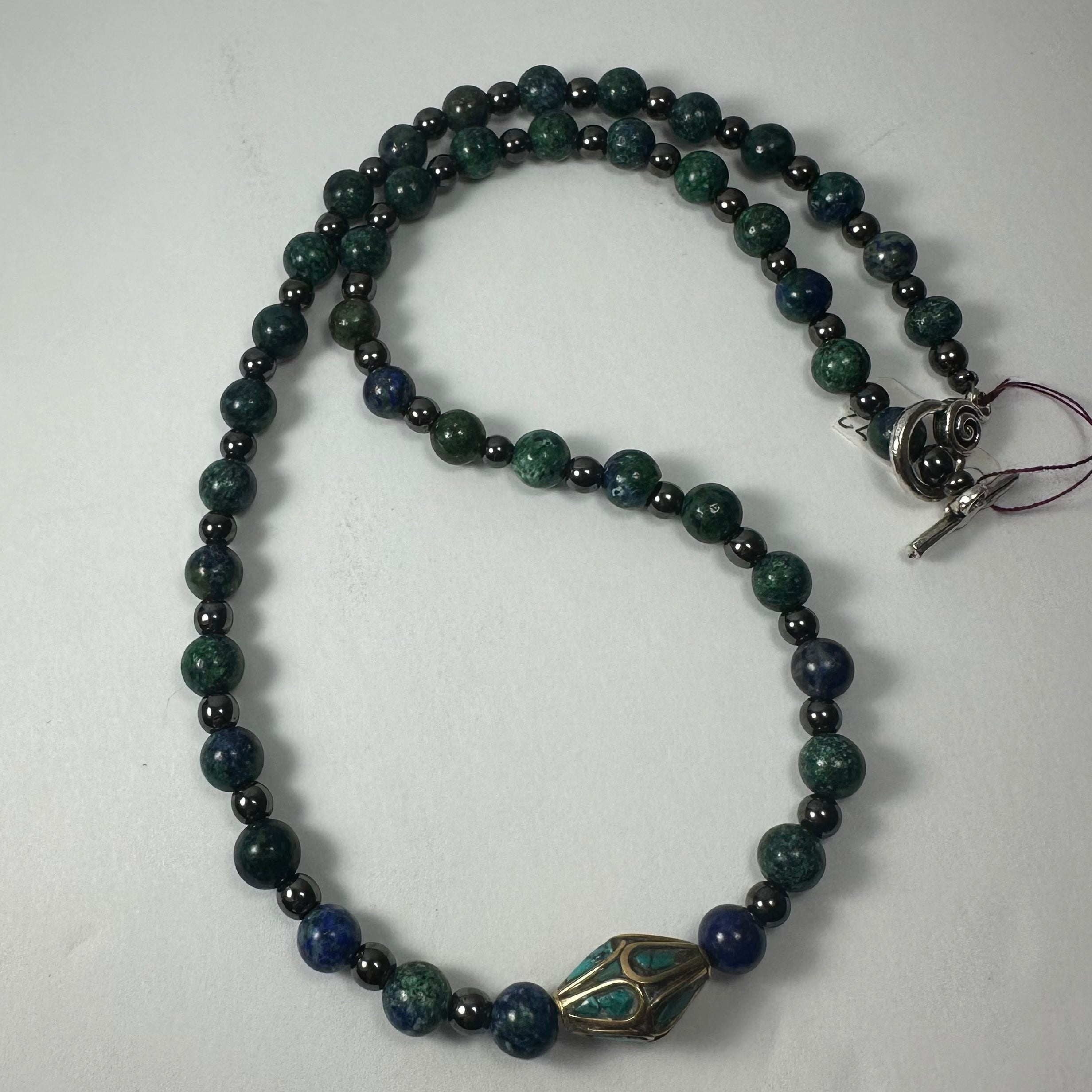 Handmade Tibetan Brass & Turquoise Necklace shown close-up with bead and pendant details