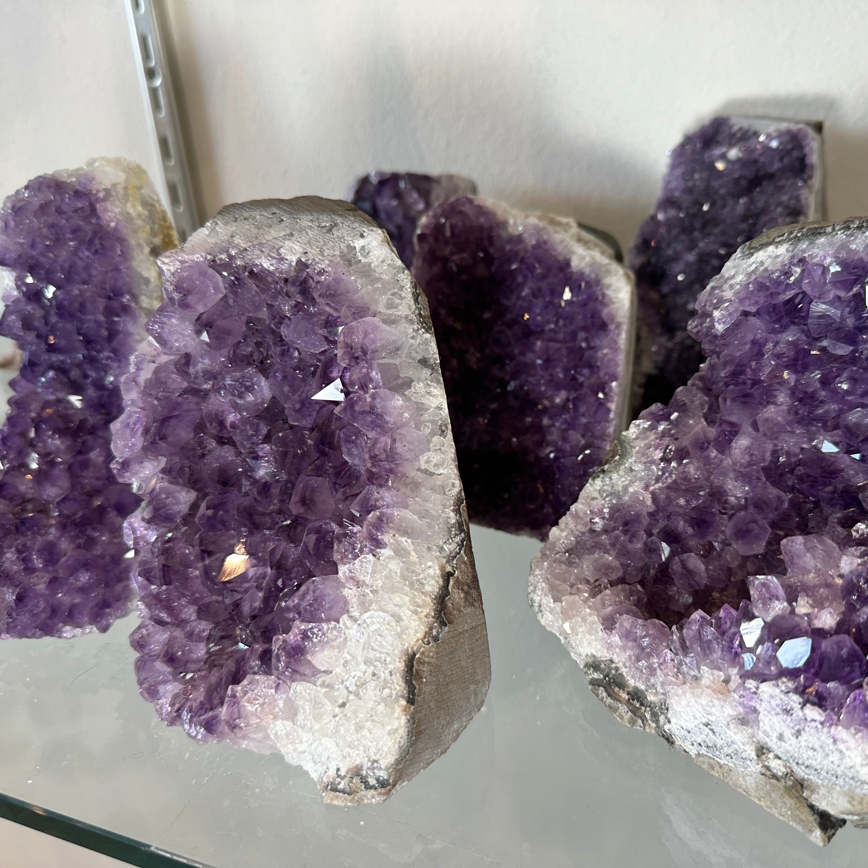Large cut base Amethyst Druze specimen from Uruguay with purple crystal clusters