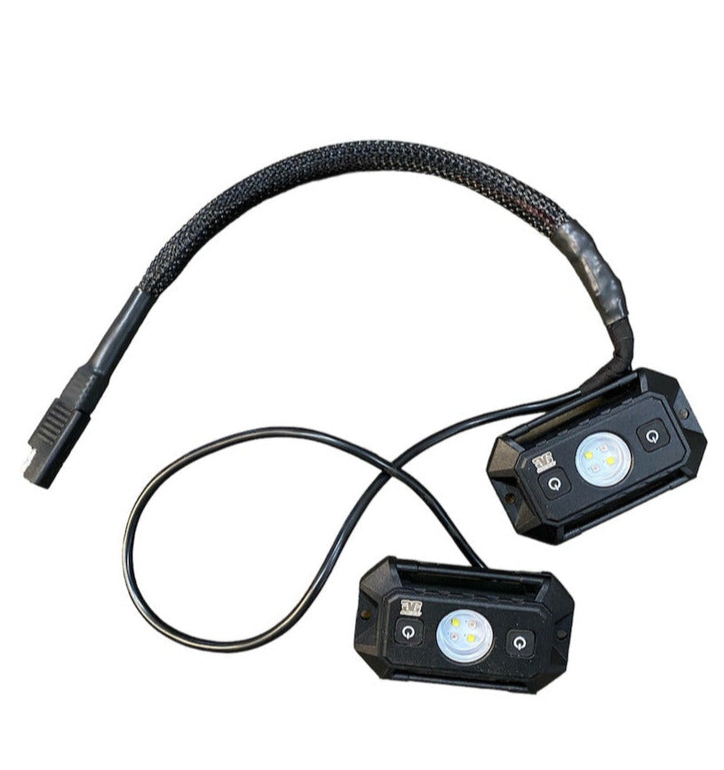 Speed UTV dual dome light kit installed on roll bar with Velcro straps and buttons on housing