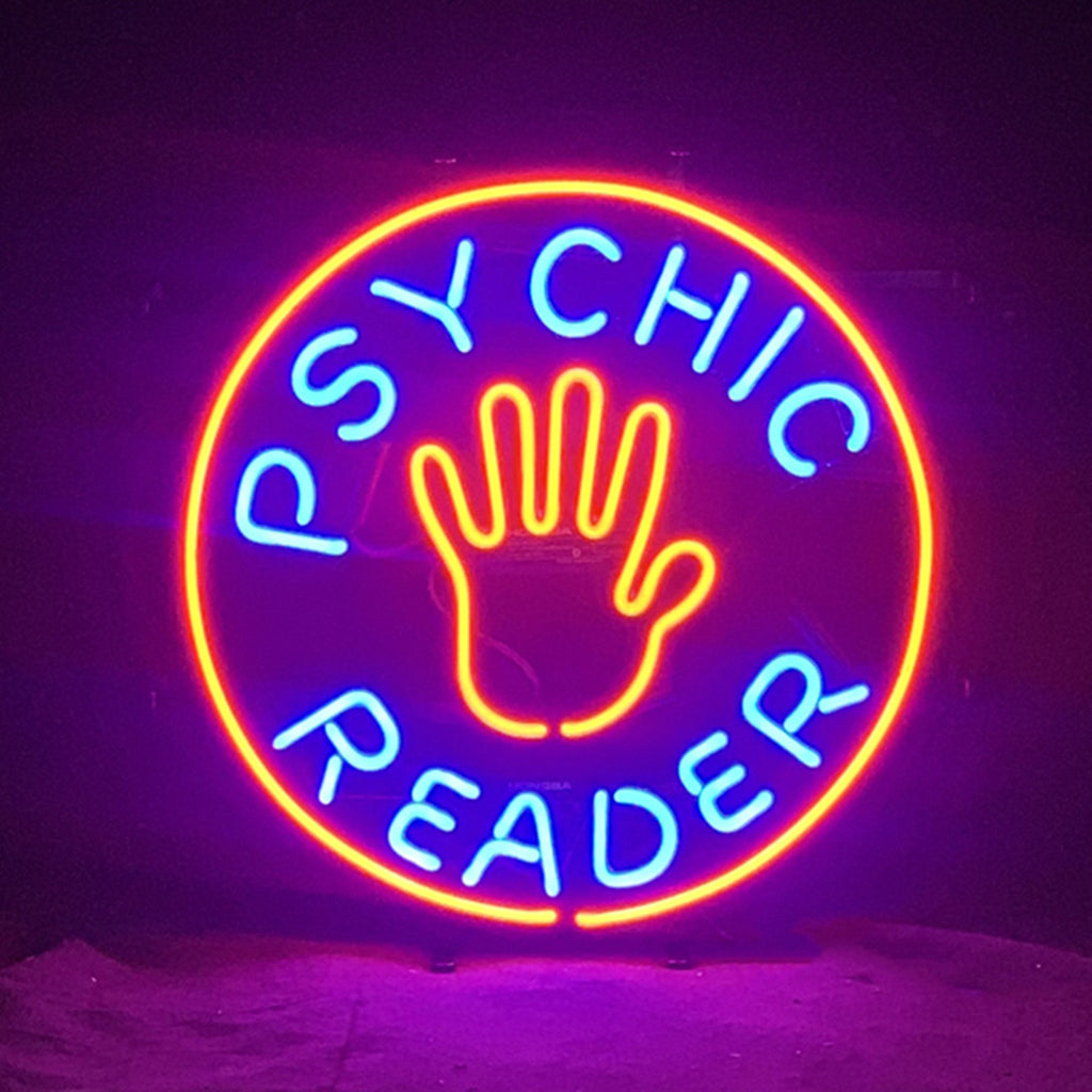Psychic Reader Neon Sign featuring a vibrant neon glow mounted on a metal grid backing