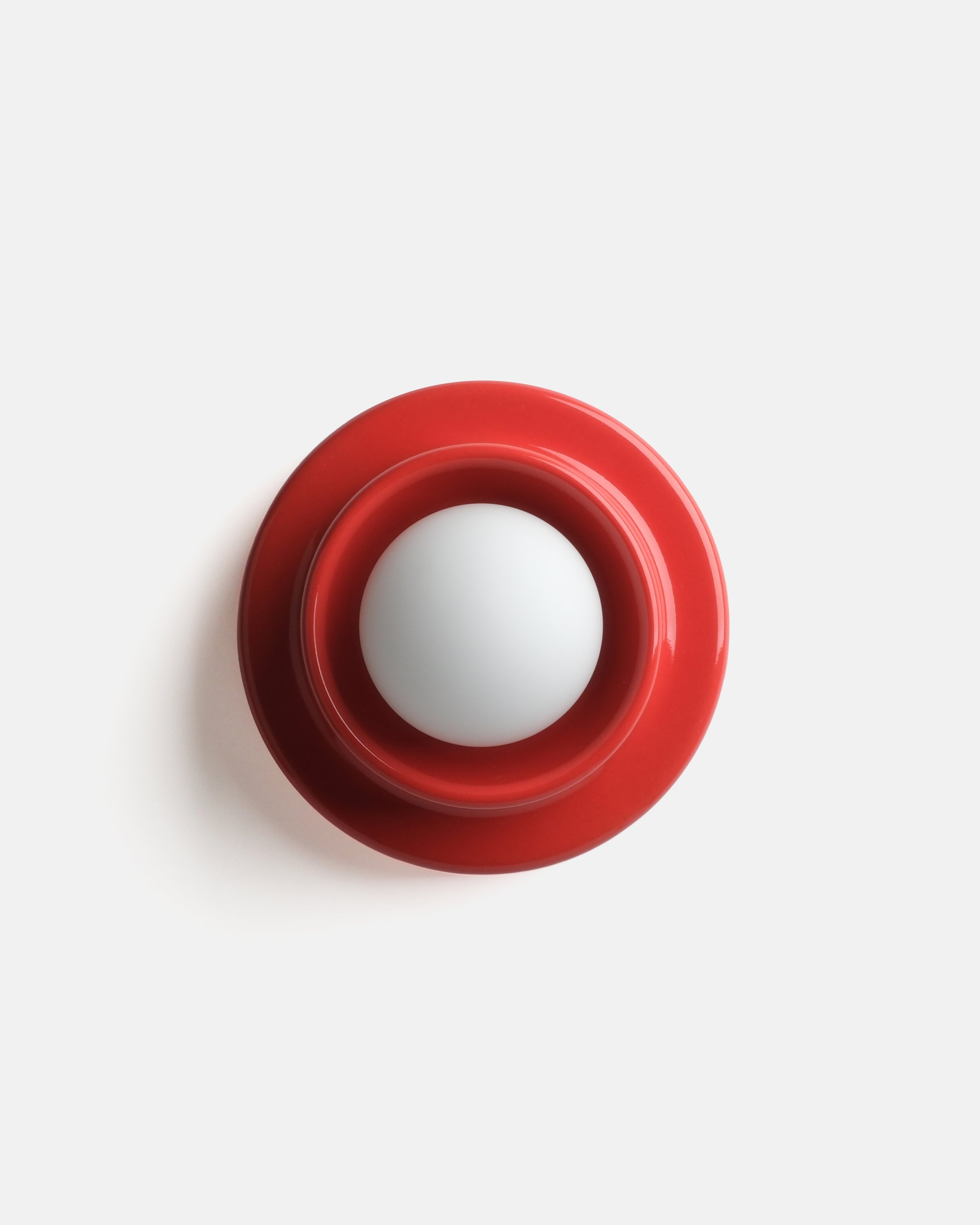 Red Q Sconce wall lamp with ceramic body and glass globe