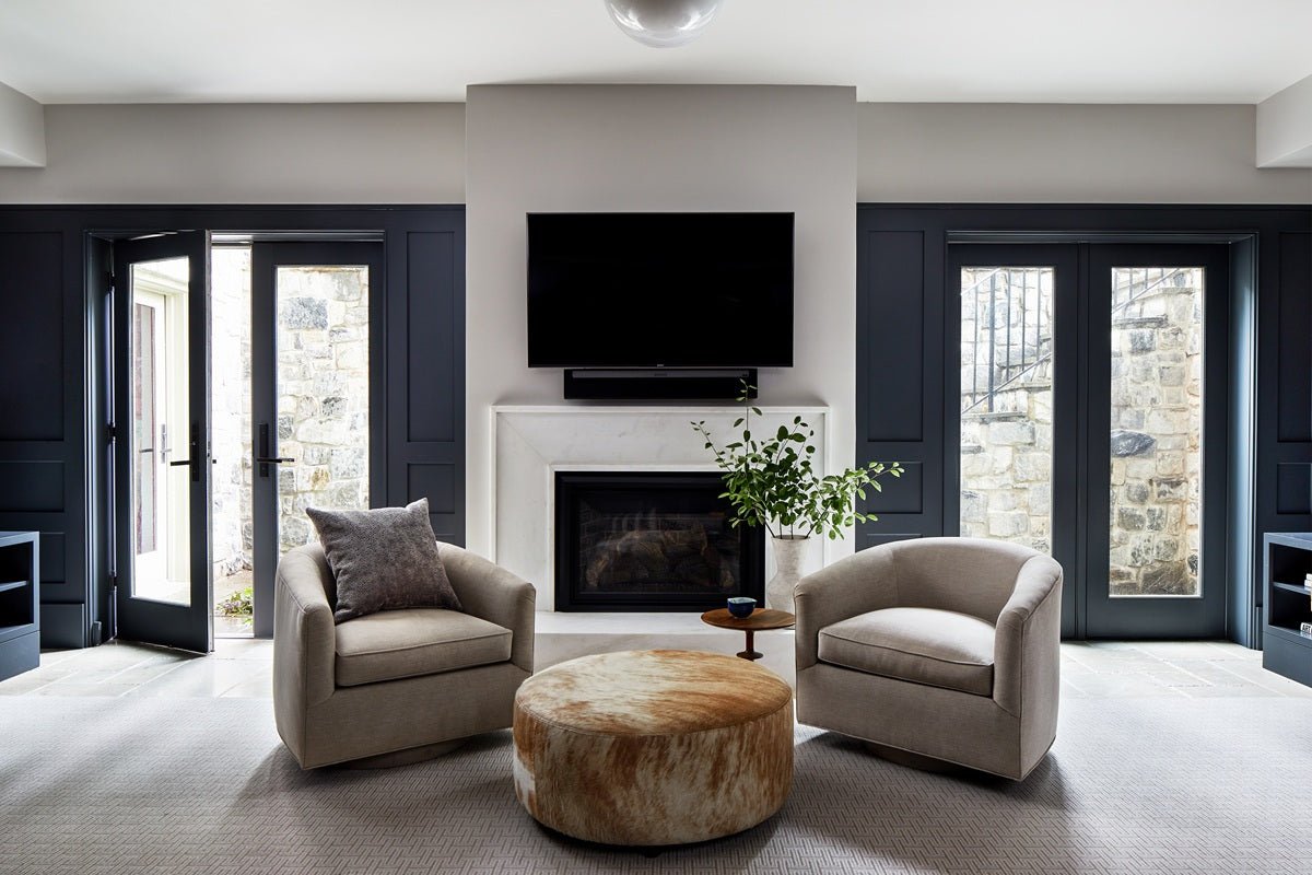 Round Cowhide Ottoman by Homelosophy