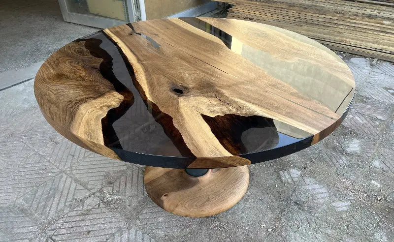 Custom round epoxy resin walnut dining table with wood and metal base