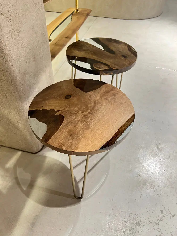 Round walnut wood side table with clear epoxy resin and straight edges