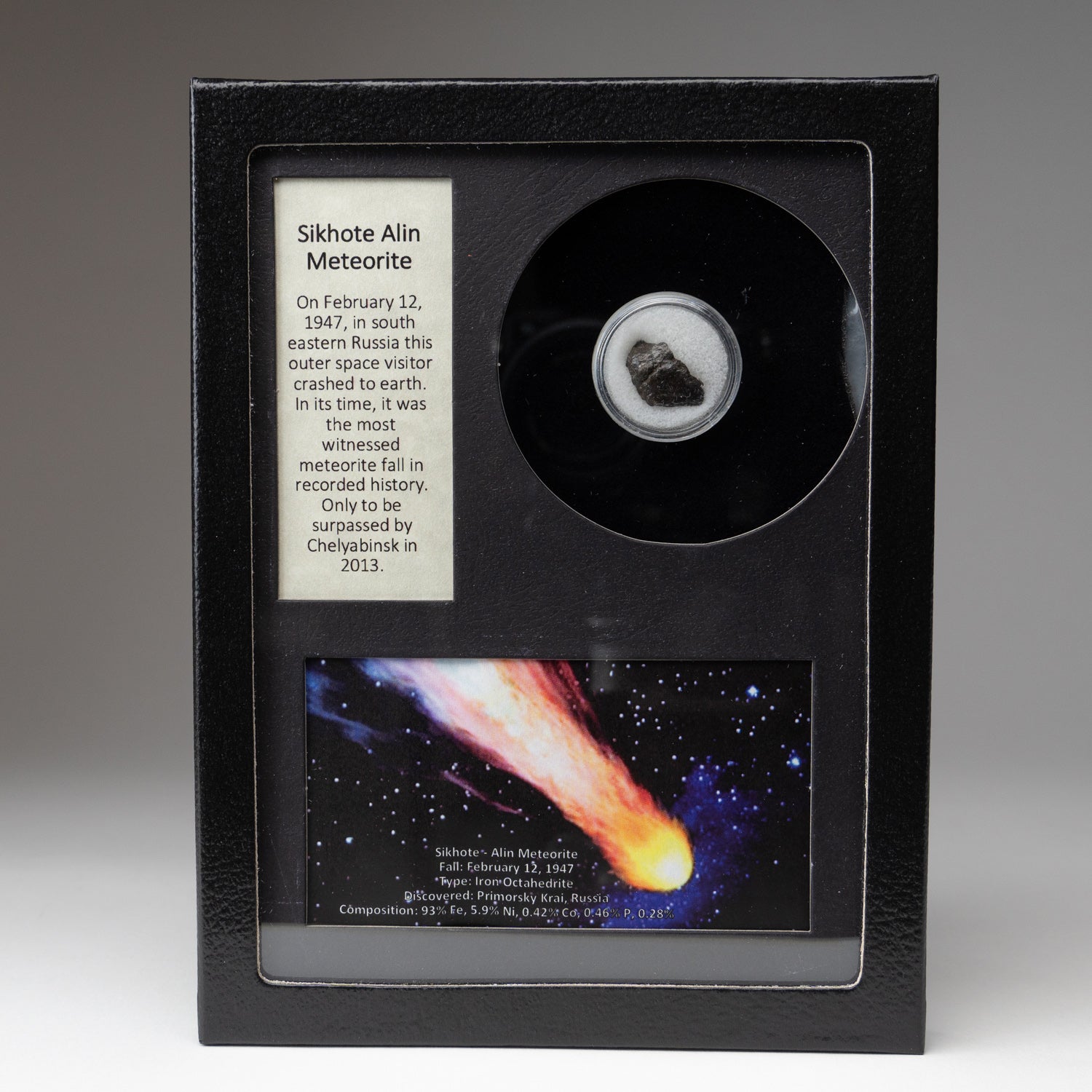 Genuine Sikhote-Alin Meteorite fragment in glass display box with color image and label