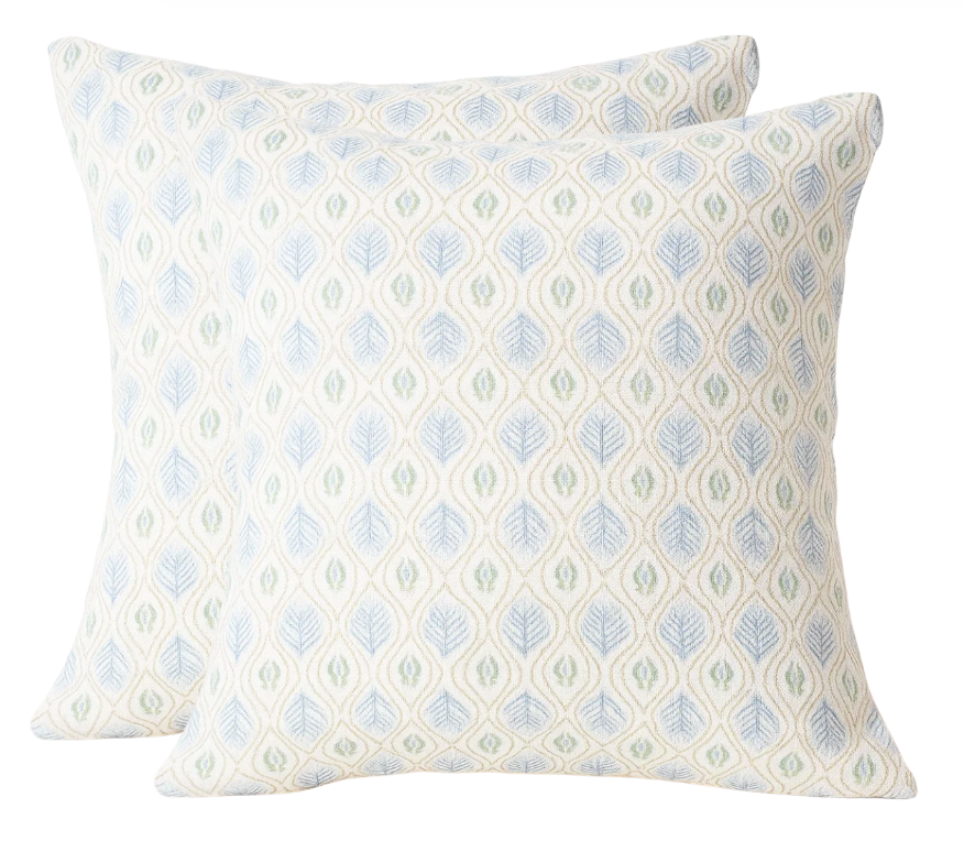Edward Floral Pillow Cover in blue and green floral textile on front with ivory linen fabric back visible in photo