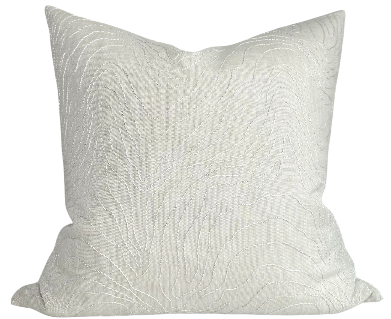 Formation Embroidered Pillow Cover in Oyster on a couch