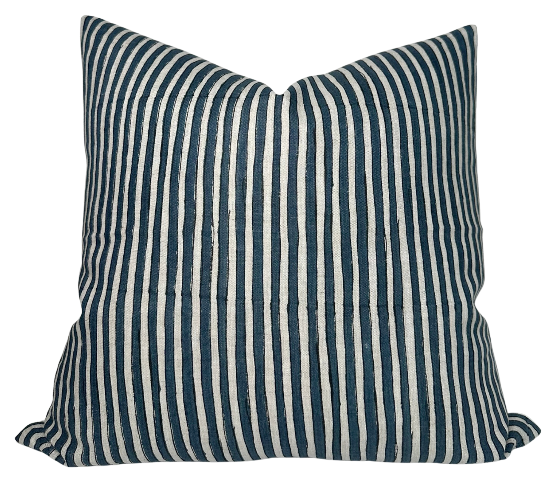 Ticking Pillow Cover in Indian Teal with ivory linen back, shown on a sofa setting
