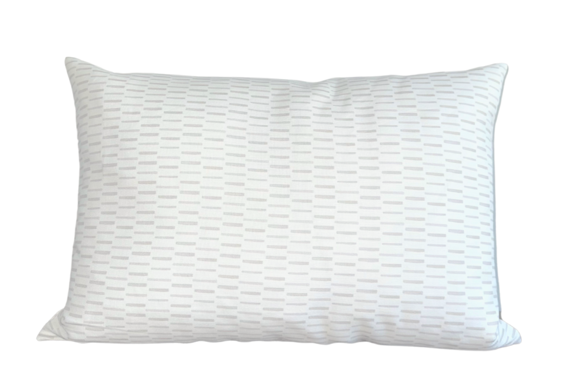 Sweetgrass Pillow Cover with floral pattern on front and ivory linen on back displayed on a sofa