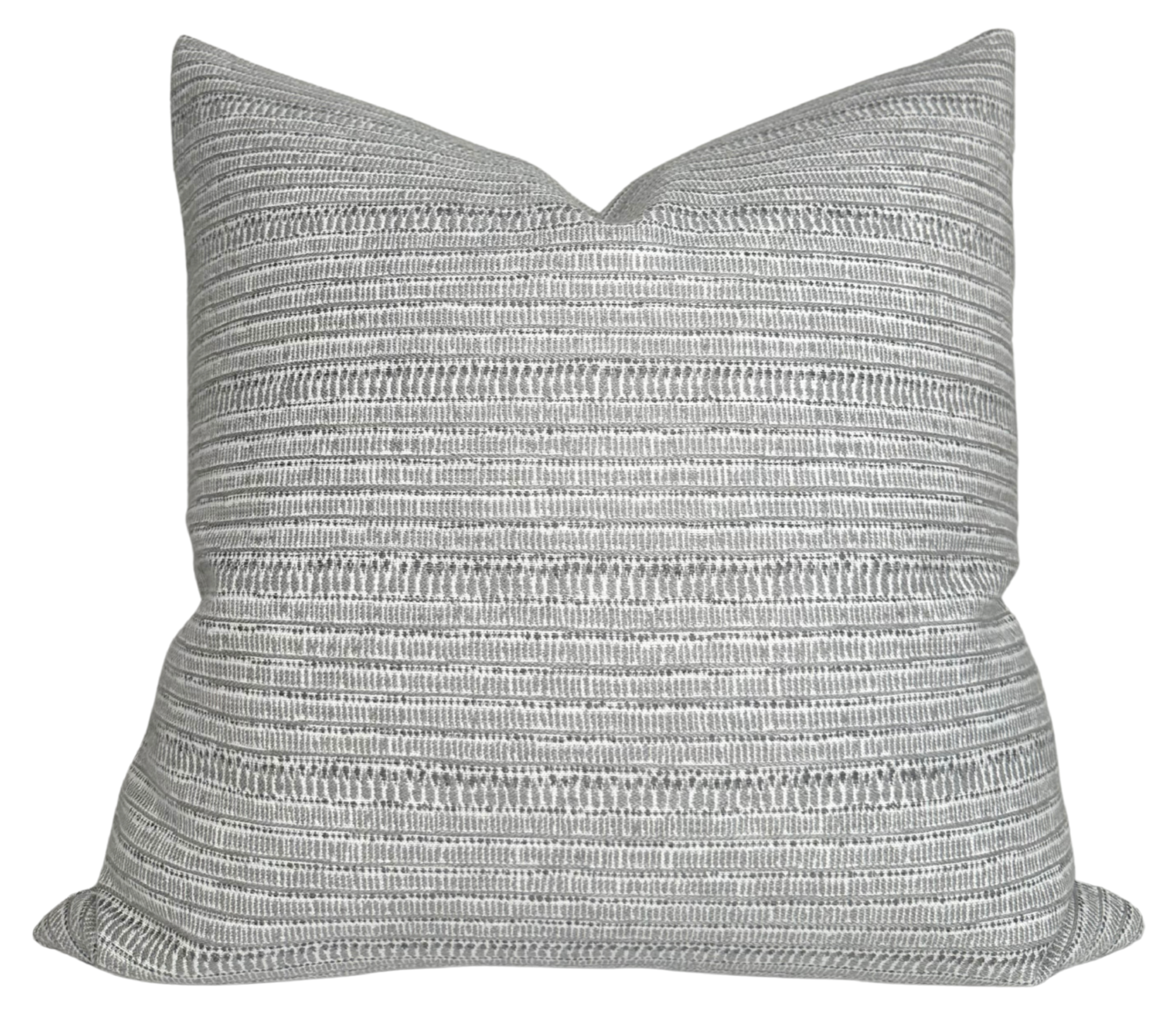 Saqqara Woven Pillow Cover in Albatross grey from Walter G Textiles displayed with a neutral backdrop