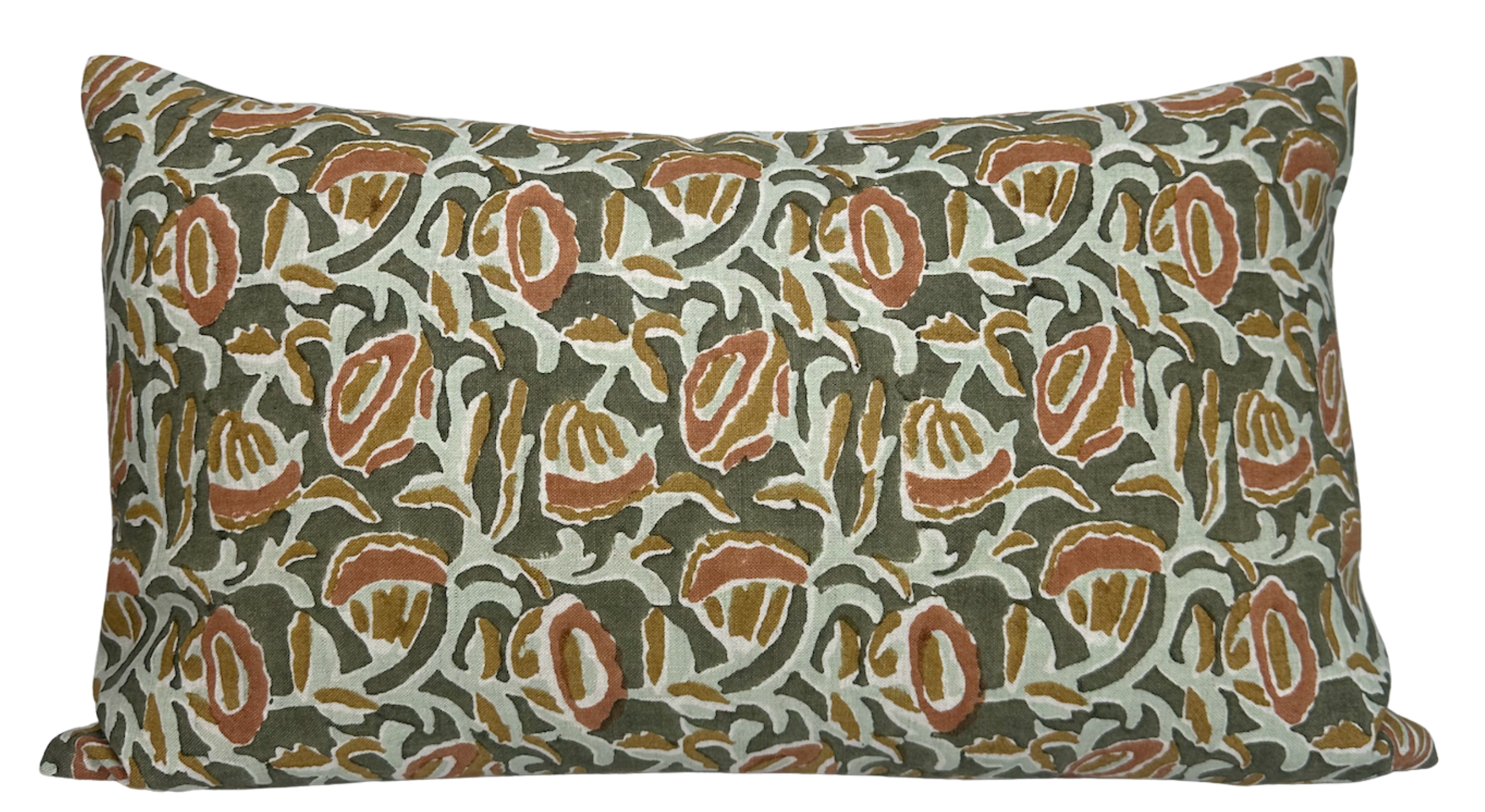 Marbella Pillow Cover with green printed front and ivory linen back displayed on a bed