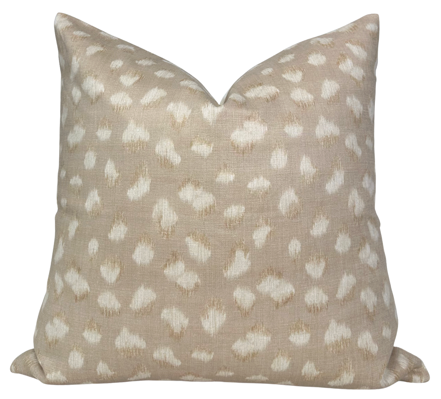 Close-up of the Feline Pillow Cover in beige and ivory showing feline print on front and natural linen fabric on back