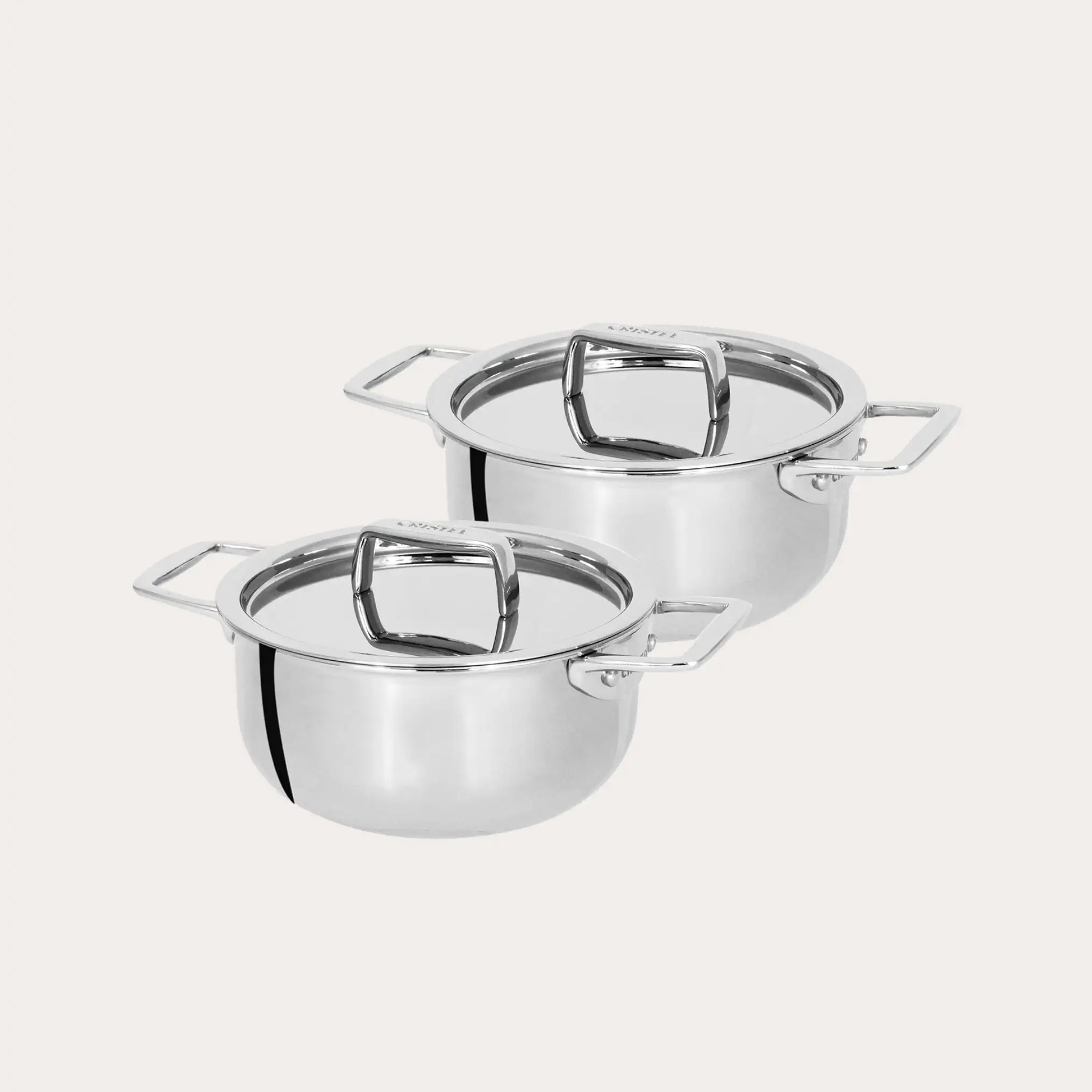 Set of 2 Mini Stewpans with Lid from CRISTEL USA displayed on a surface