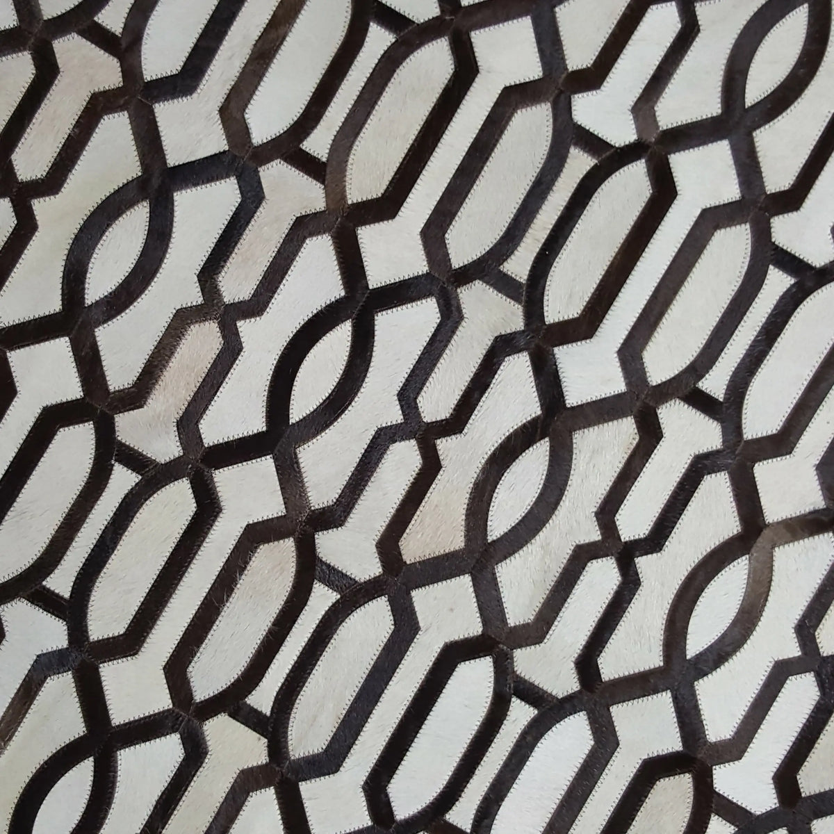 Small Trellis – Geometric Patagonian Cowhide Rug by Homelosophy