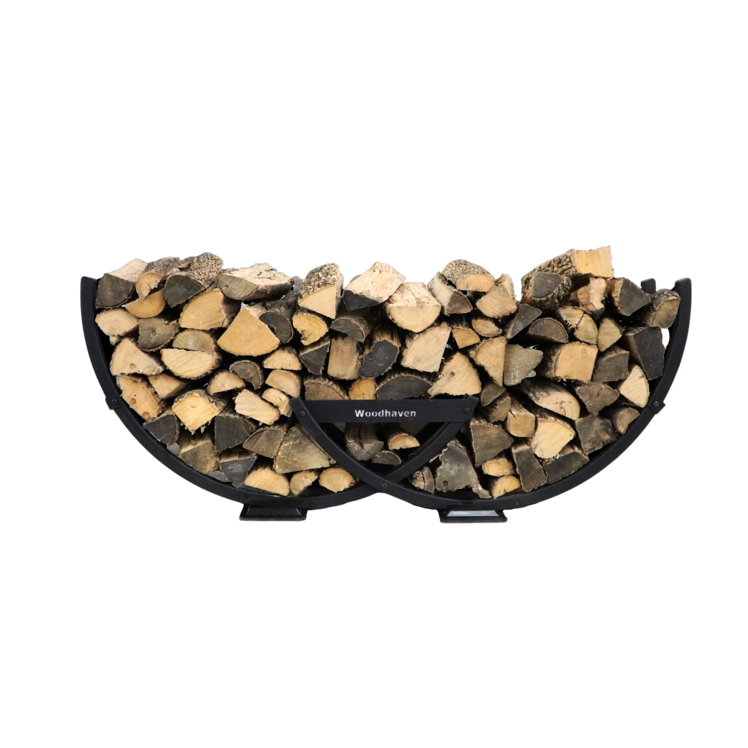 Winter Workman firewood rack by The Woodhaven showing curved steel design and wood storage