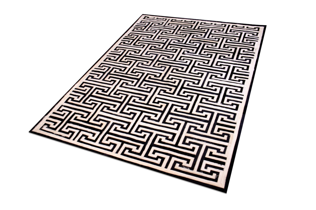 T Model – Maze-Inspired Cowhide Patch Rug by Homelosophy