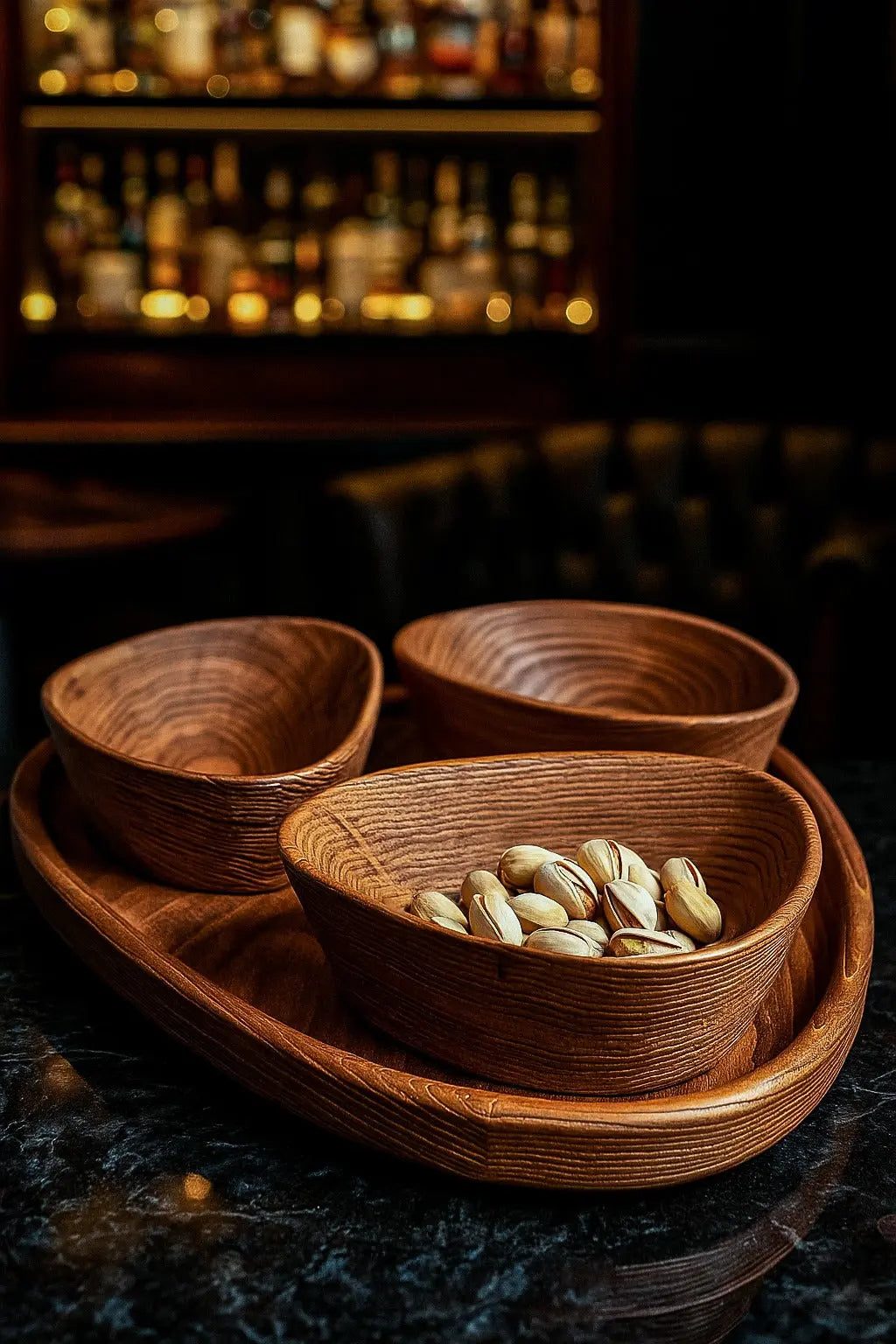 Set of handcrafted wooden nut bowls with tray showing natural wood grain and sandblasted texture