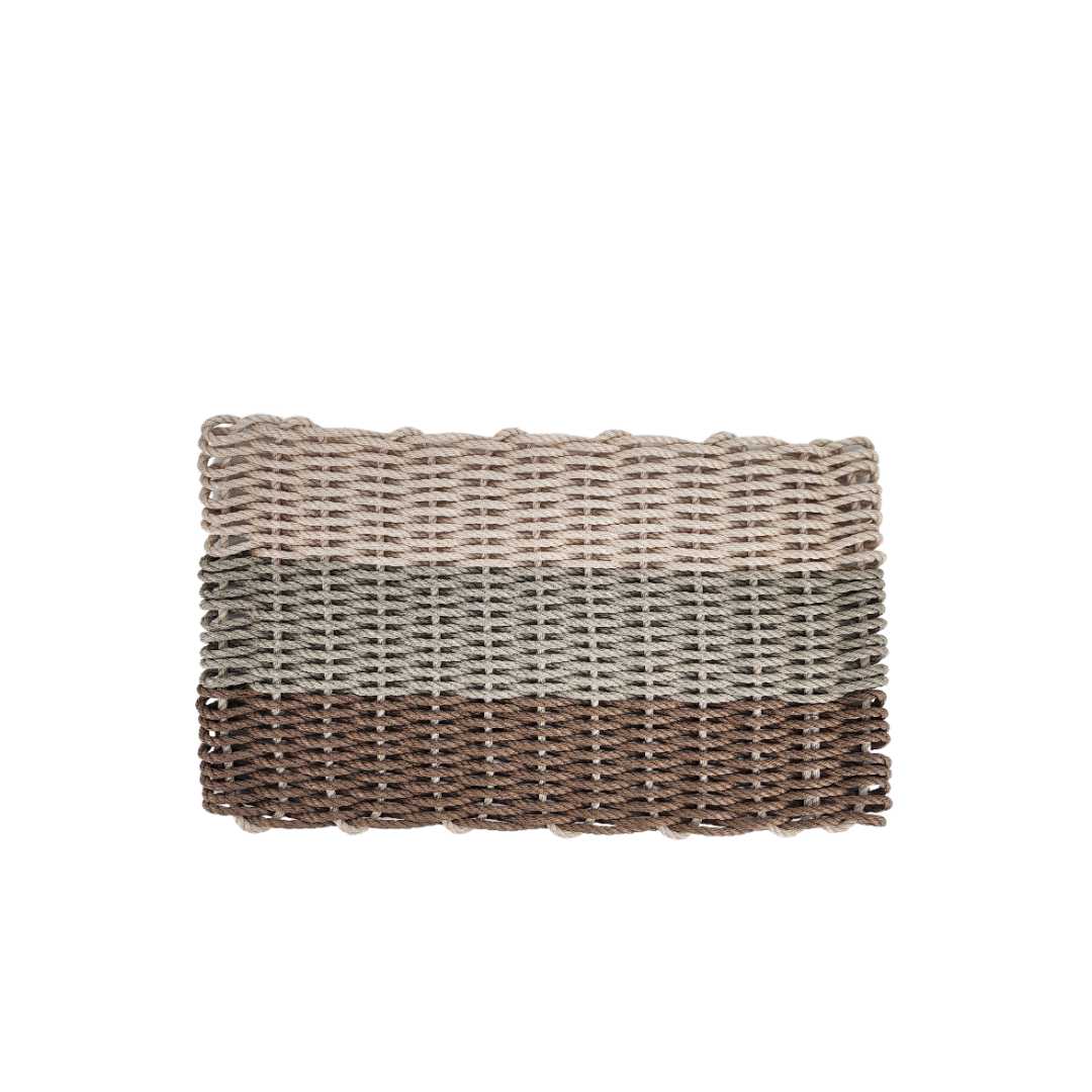 Brown, tan, and light tan ombre handmade rope mat by Little Salty Rope