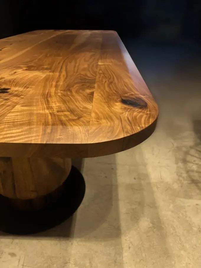 Solid walnut wood dining table with edge-glued tabletop and wooden tulip legs