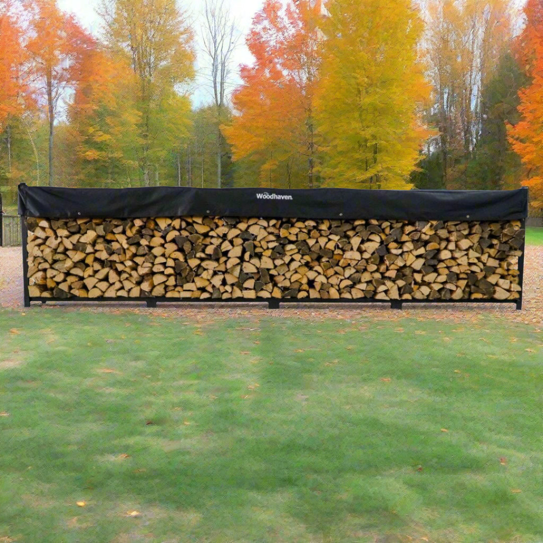 Woodhaven 16 ft Firewood Rack holding stacked firewood outdoors