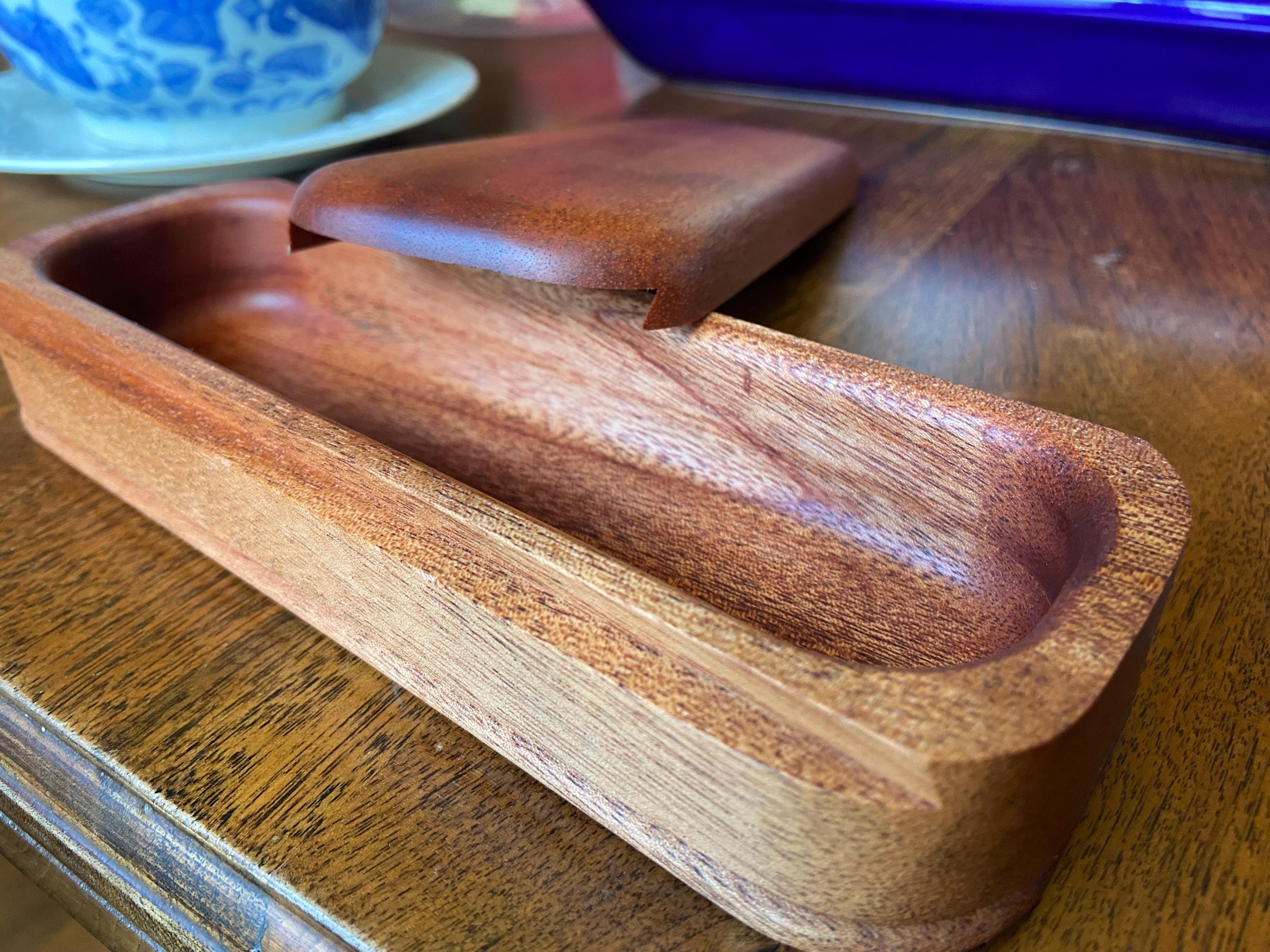 Handcrafted mahogany keepsake box with sliding dovetail joinery and beaded bottom detail