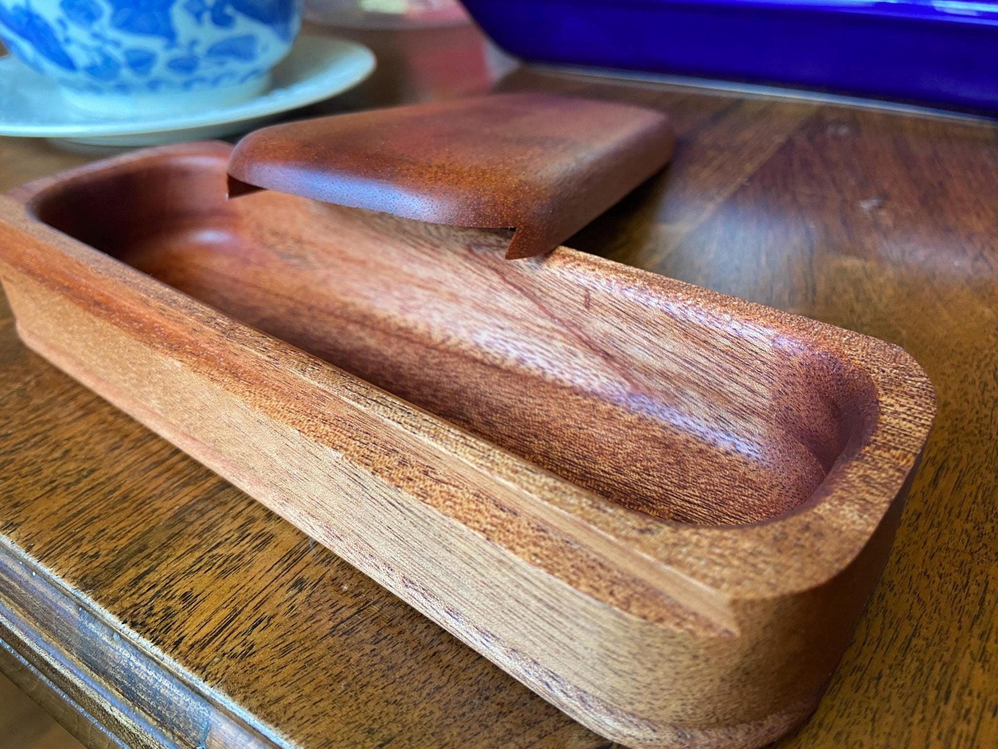 Handcrafted mahogany keepsake box with sliding dovetail joinery and beaded bottom detail