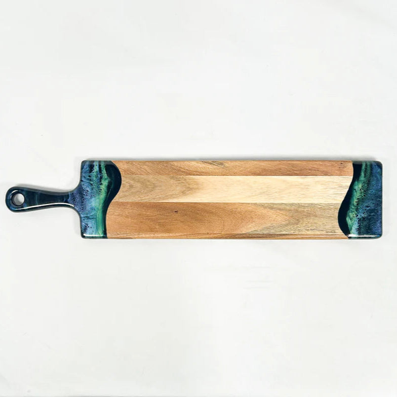 Wooden baguette resin serving with a blue and green resin handle on a white background