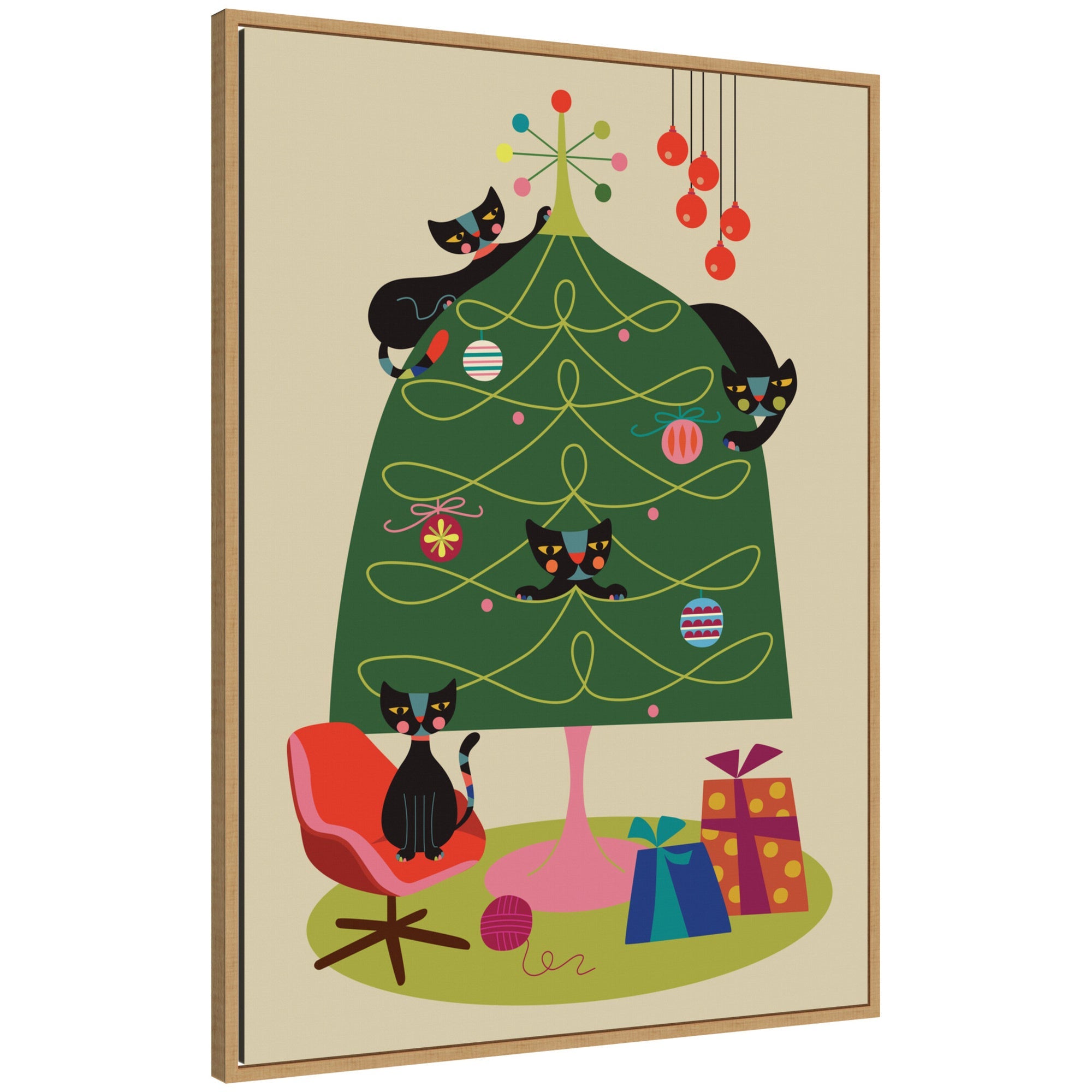 Framed canvas featuring black cats playing around a stylized colorful Christmas tree with presents and a retro chair.