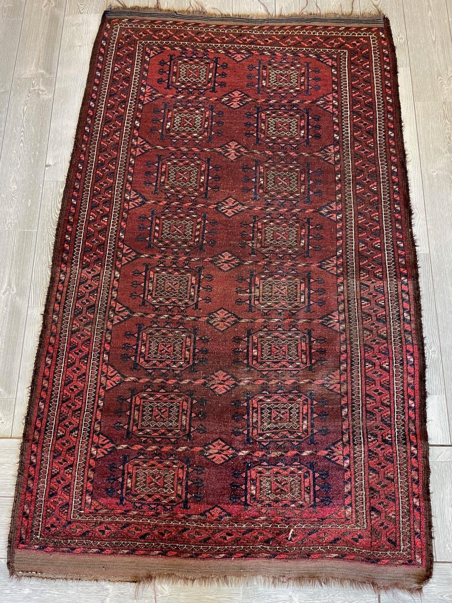 Antique 1880’s Baluch Rug displaying geometric patterns and rich aged texture