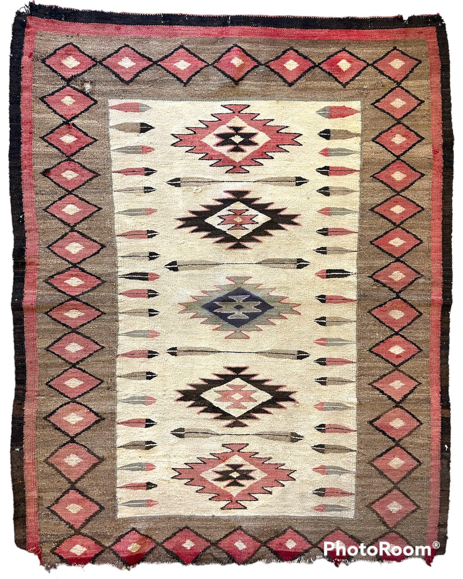 Antique 1880’s Navajo Rug 4’ x 5’ showing neutral tone dyes and hand-knotted texture