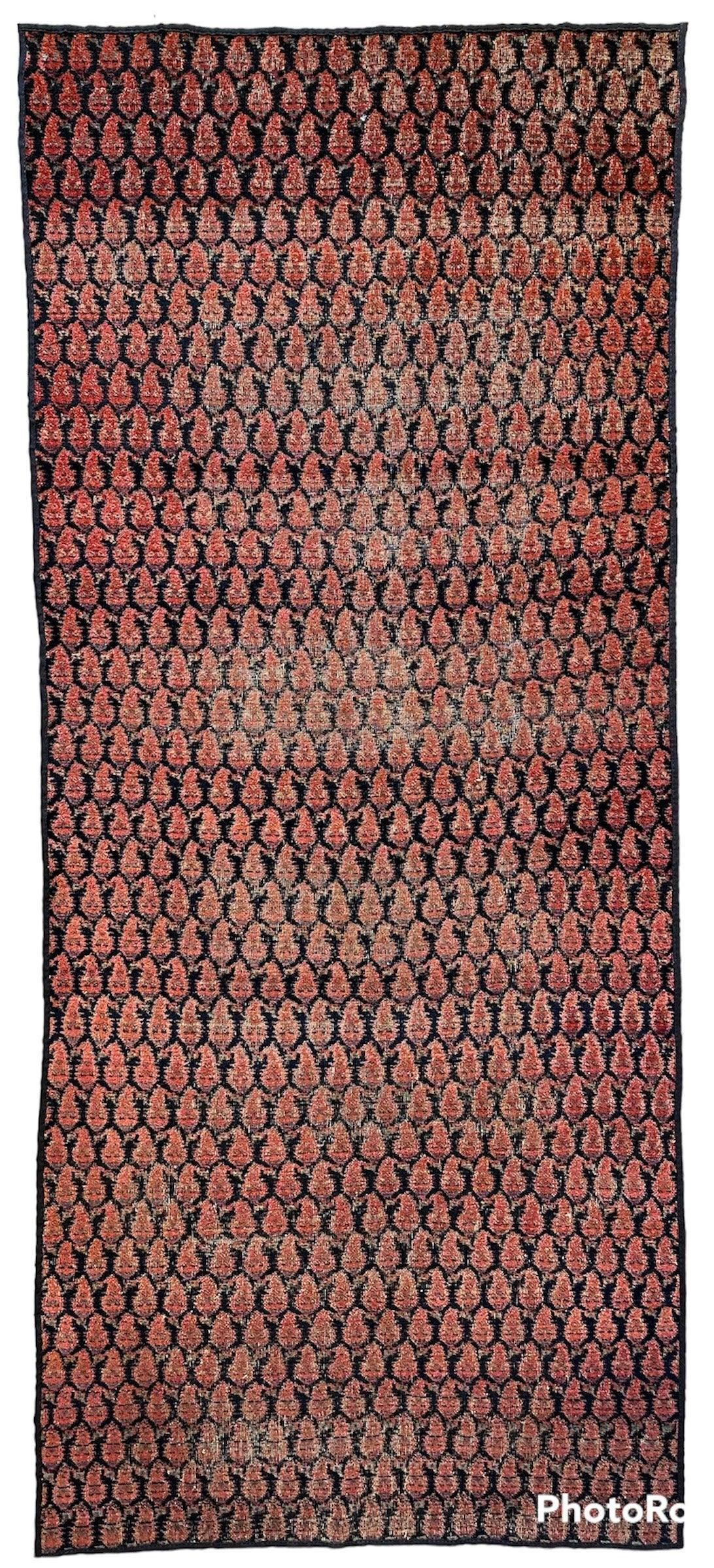 Antique Kurdish Afshar runner rug with all-over paisley pattern in muted red and blue tones on wool, measuring 3’3” x 7’7”