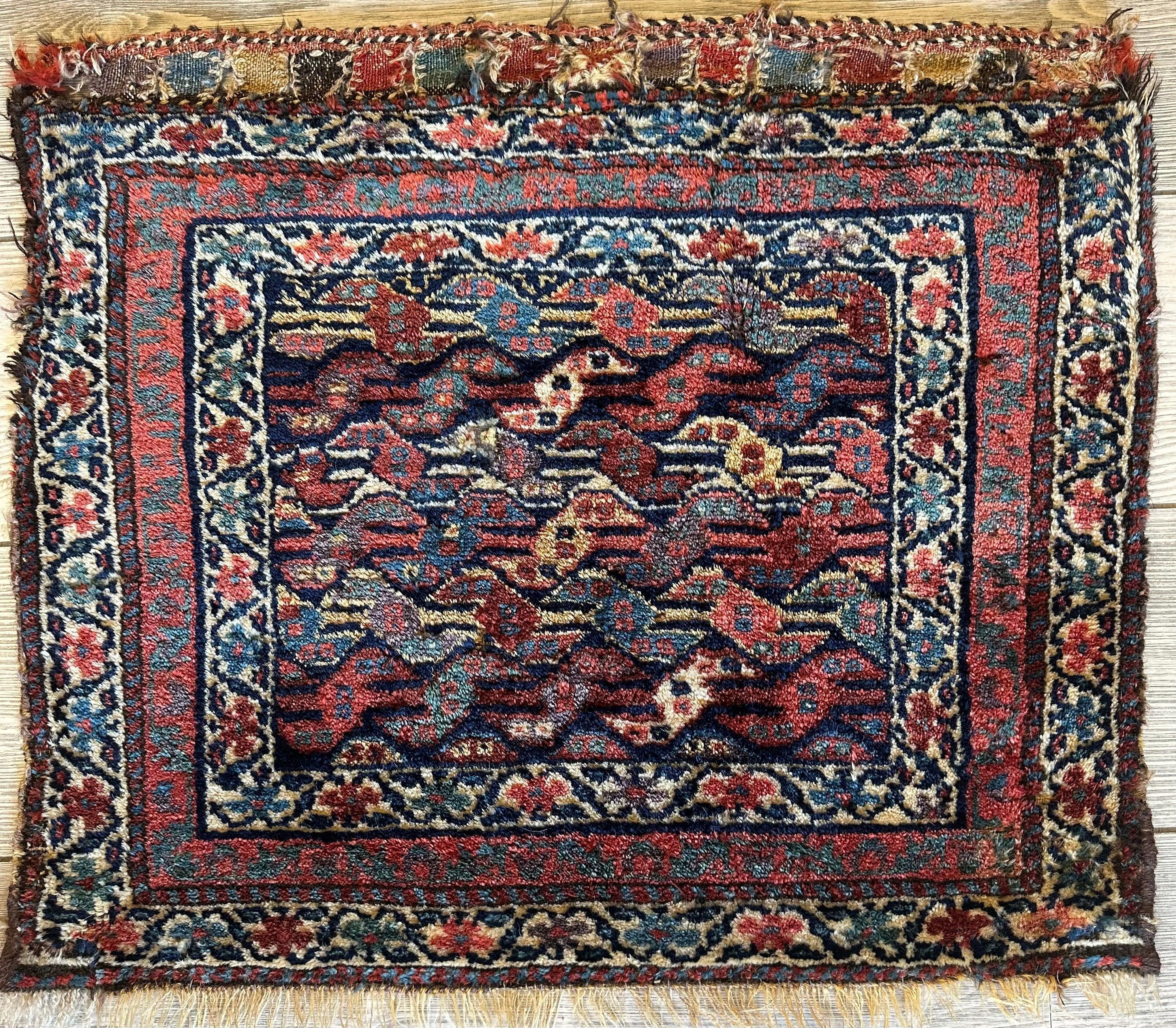 Antique small Kurdish square decorative hanging rug 22x24 featuring natural dyes and intricate patterns