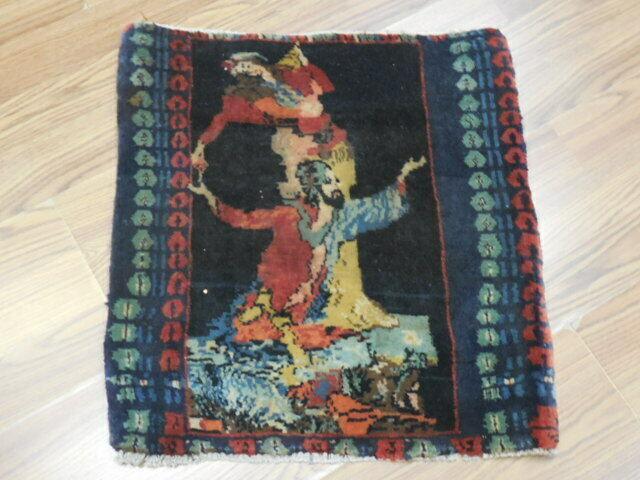 Vintage 1920s hand-knotted pictorial rug with warm colors and intricate patterns