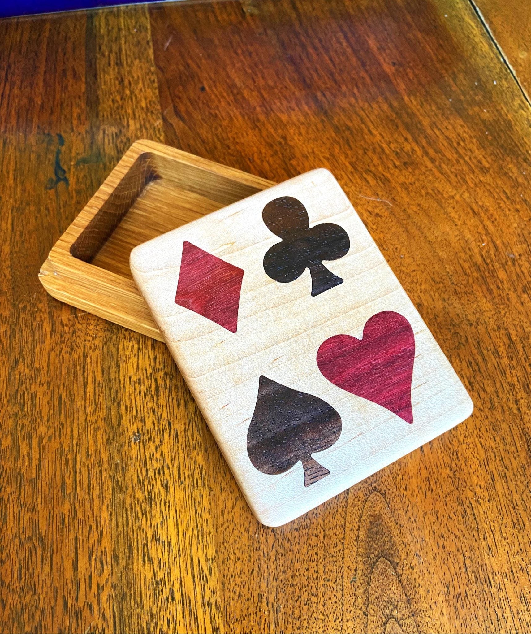 Handcrafted wooden playing card box with wood inlay detail
